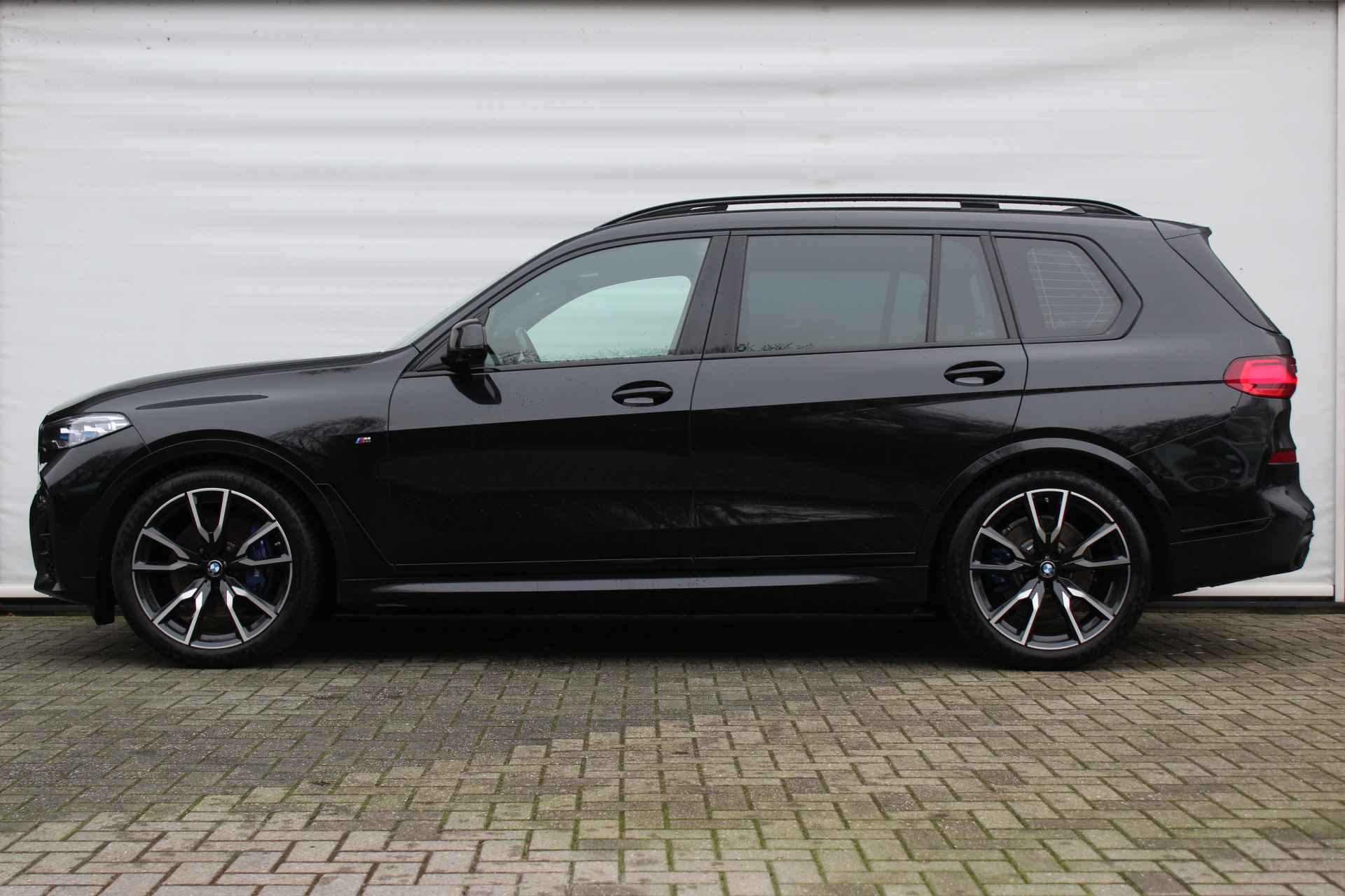 BMW X7 xDrive40i High Executive M Sport Automaat / Panoramadak Sky Lounge / Trekhaak / Laserlight / Head-Up / Parking Assistant Plus / Live Cockpit Professional / Stoelverwarming voor + achter - 3/32