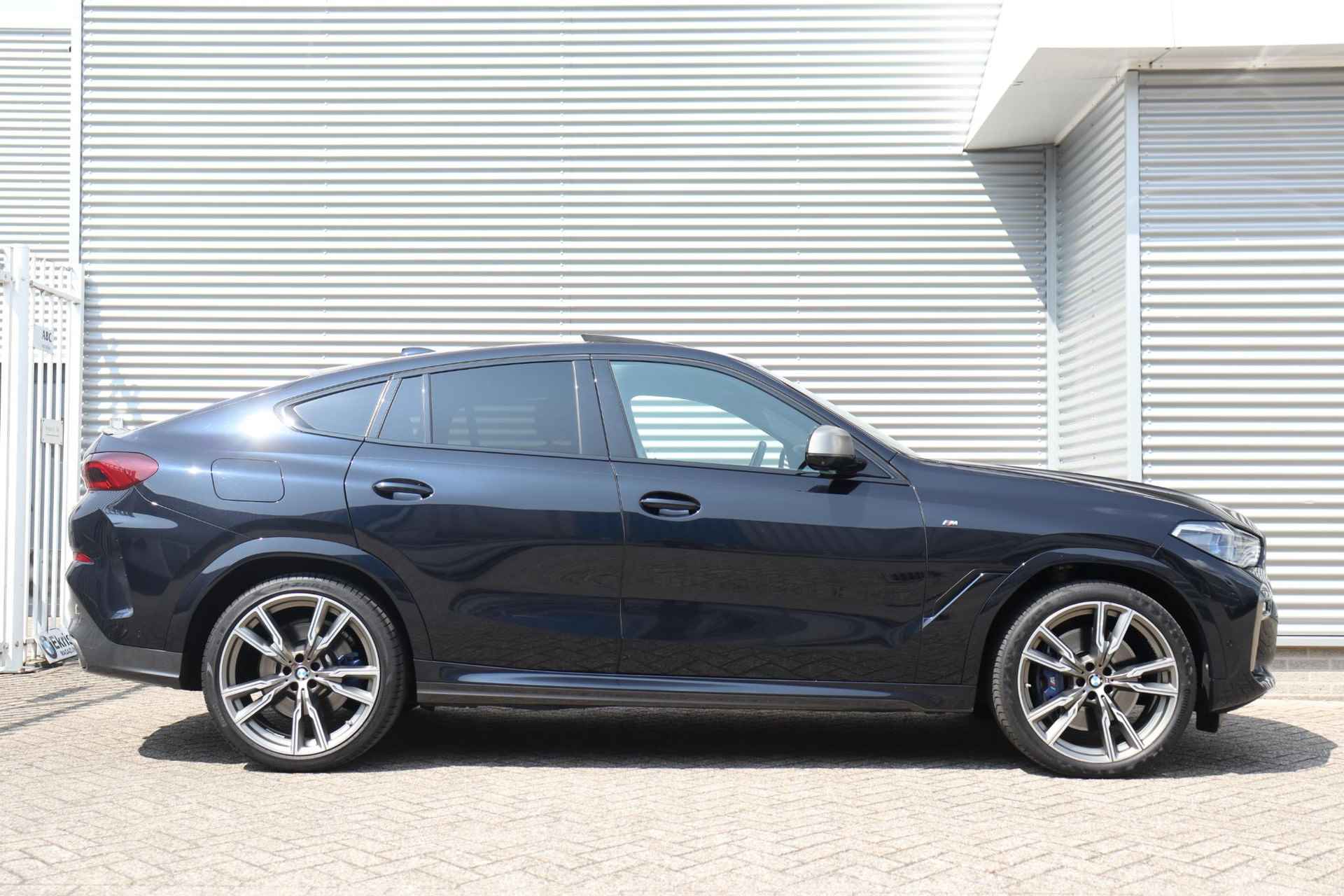 BMW X6 M50d | High Executive | Trekhaak | Sky Lounge | CoPilot Pack | Warmte Comfortpakket | Harman Kardon | Head-Up | Active Steering | Parking Assistant Plus | Soft Close | Laserlight | Comfort Access | 22''LMV | Showroom Sale - 5/47