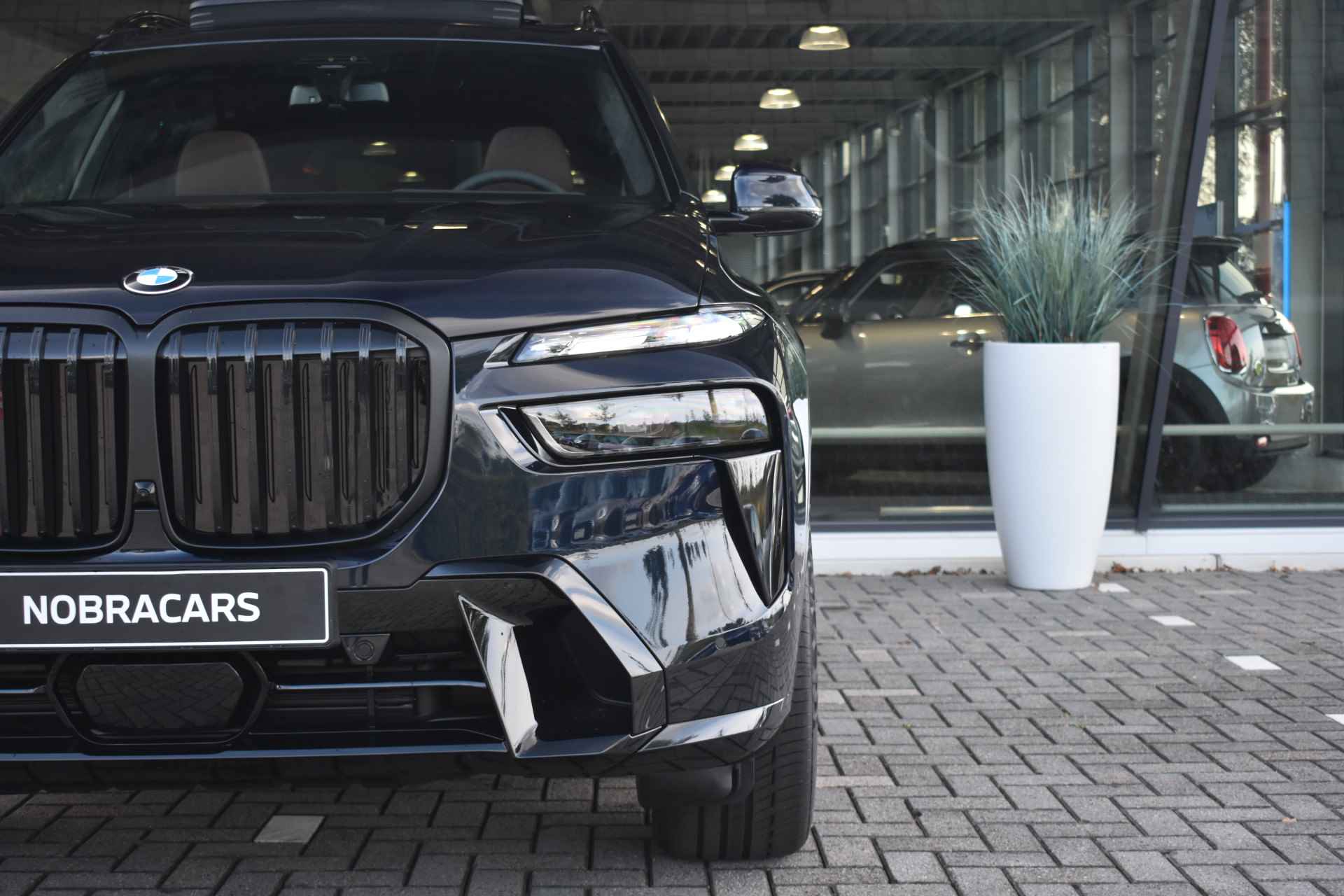 BMW X7 xDrive40i High Executive M Sport Automaat / Panoramadak Sky Lounge / Trekhaak / Massagefunctie / Active Steering / Bowers & Wilkins / Parking Assistant Professional / Soft-Close - 9/88