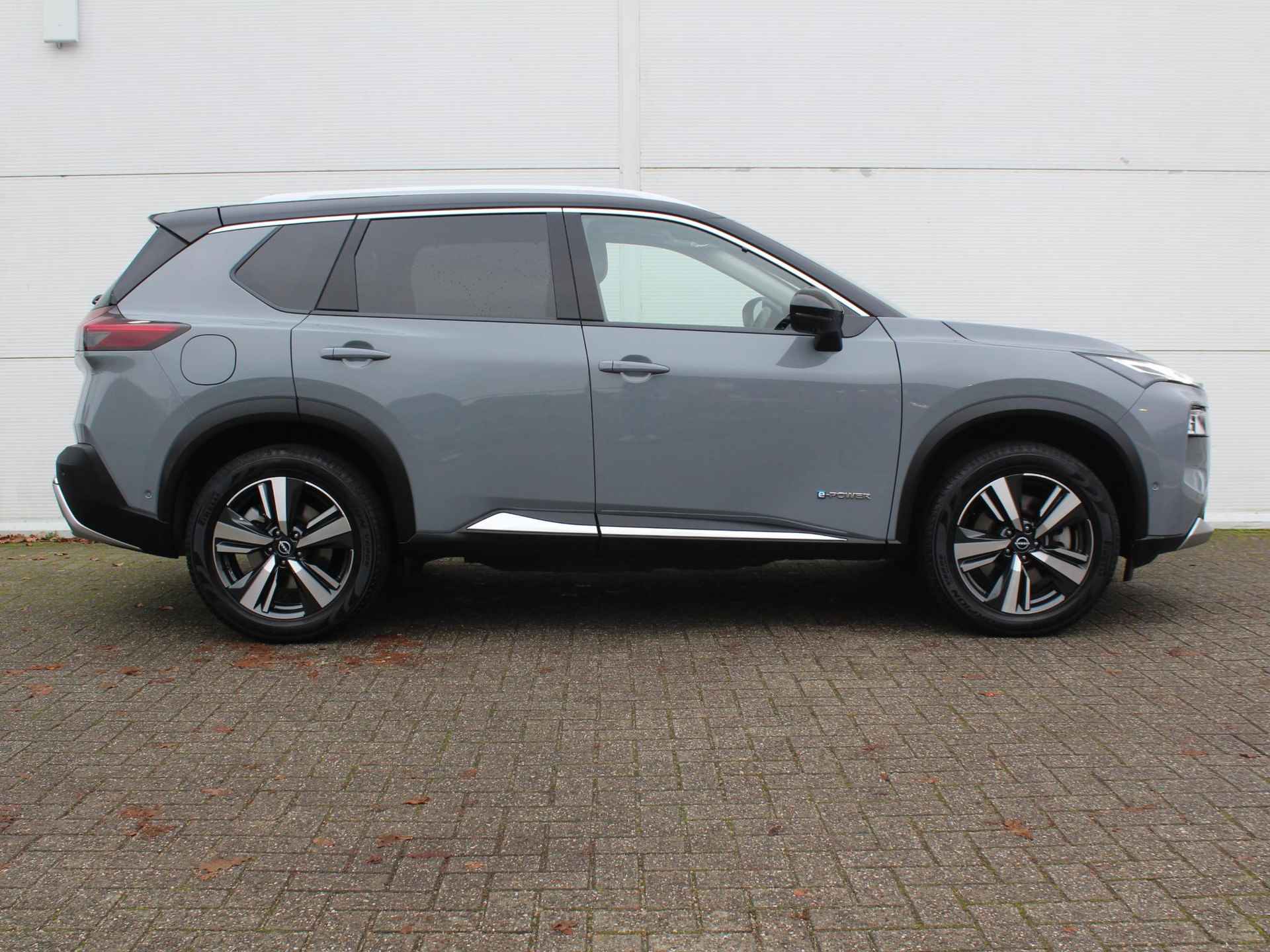 Nissan X-Trail 1.5 e-4orce Tekna 4WD 7p. / Trekhaak (1650 KG) / Navigatie + Apple Carplay/Android Auto / Elektrisch Schuif-/Kanteldak / Cruise Control Adaptief / 360* Camera / - 17/54