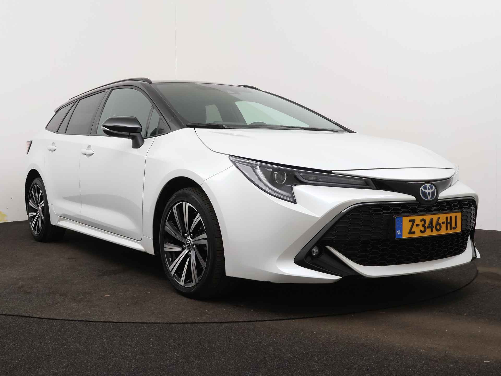 Toyota Corolla Touring Sports 1.8 Hybrid Style Limited | Navigatie | Camera | LM velgen | Cruise Control Adaptief | Climate Control | Stoel en stuurwiel verwarmd | - 18/45