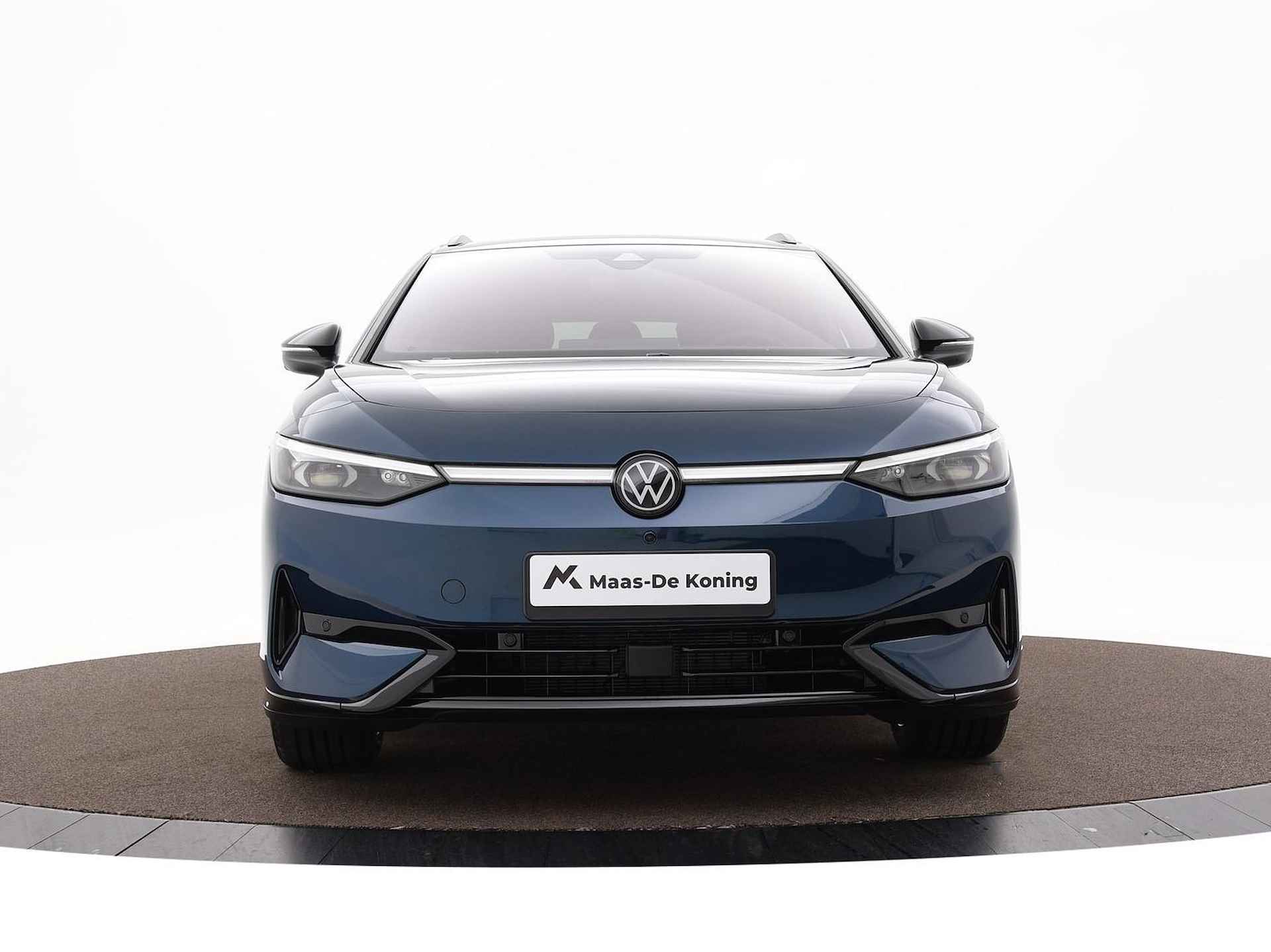 Volkswagen ID.7 Tourer Pro Business 77 kWh 286 pk Electr. aandrijving · Draadloze telefoonlader · - 36/48