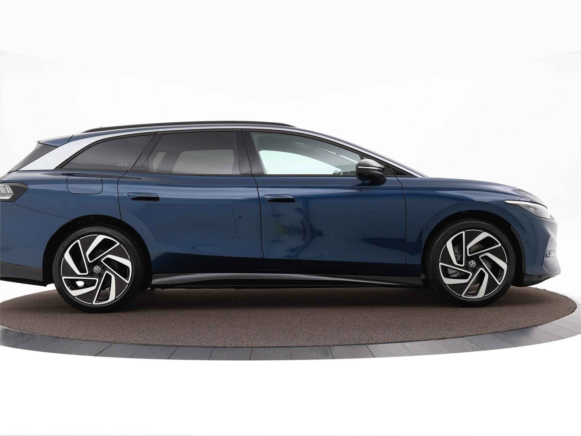 Volkswagen ID.7 Tourer Pro Business 77 kWh 286 pk Electr. aandrijving · Draadloze telefoonlader · - 38/48