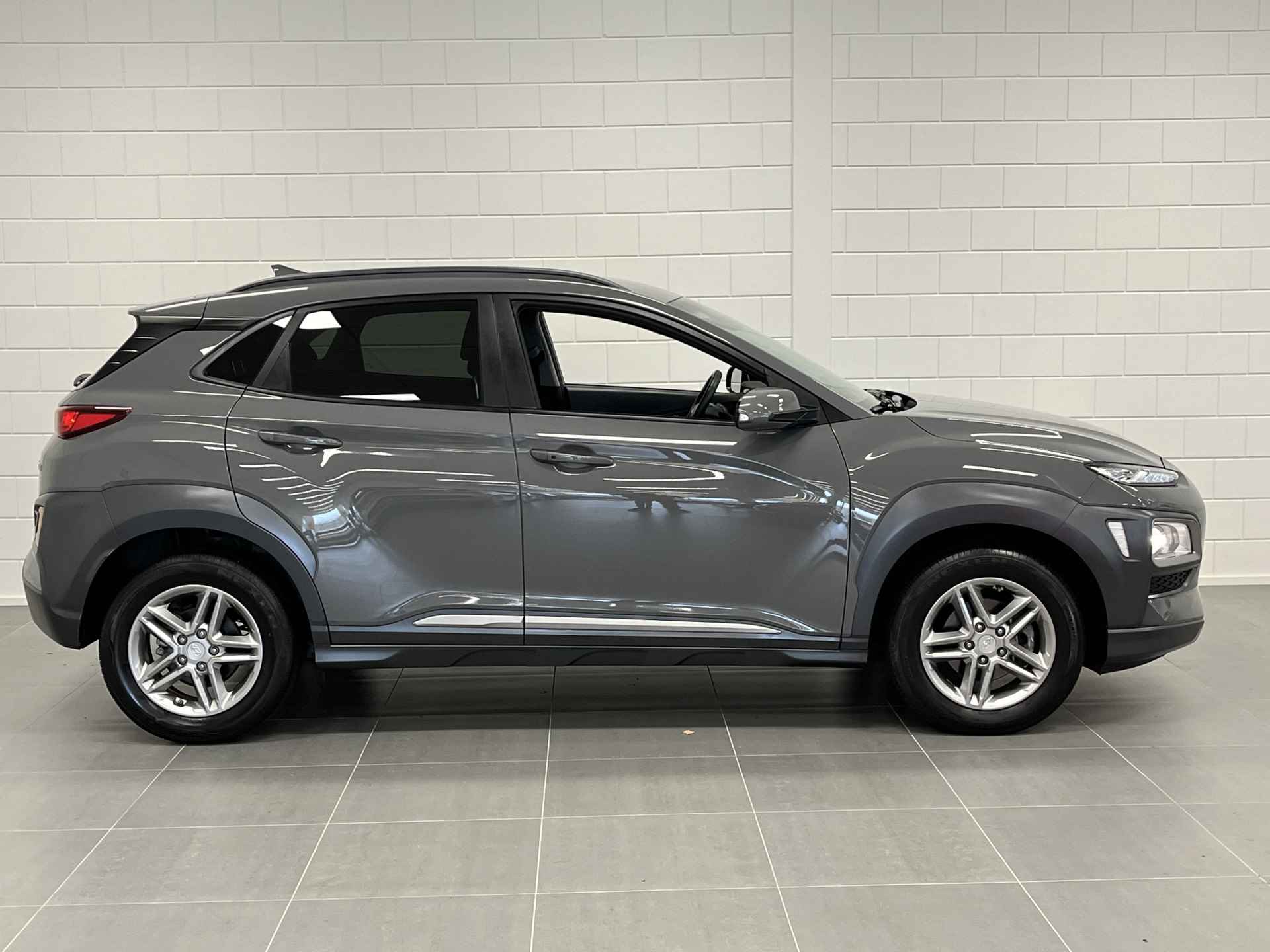 Hyundai KONA 1.0 T-GDI Fashion NAVIGATIE | PARKEERCAMERA | CLIMATE CONTROL | LEUKE AUTO MET HOGE INSTAP - 8/50