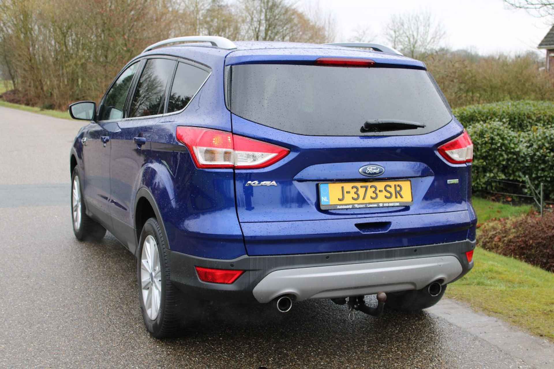 FORD Kuga 1.5 150pk Titanium ECC/Cruise/Half leer/Navi/PDC/Trekhaak/Camera - 2/33