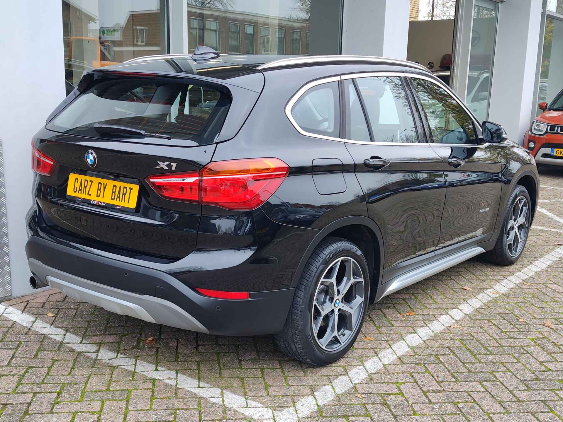 BMW X1 SDRIVE18i CENTENNIAL EXECUTIVE AUT. Leder | Navi | 18" Lichtmetalen velgen - 6/43