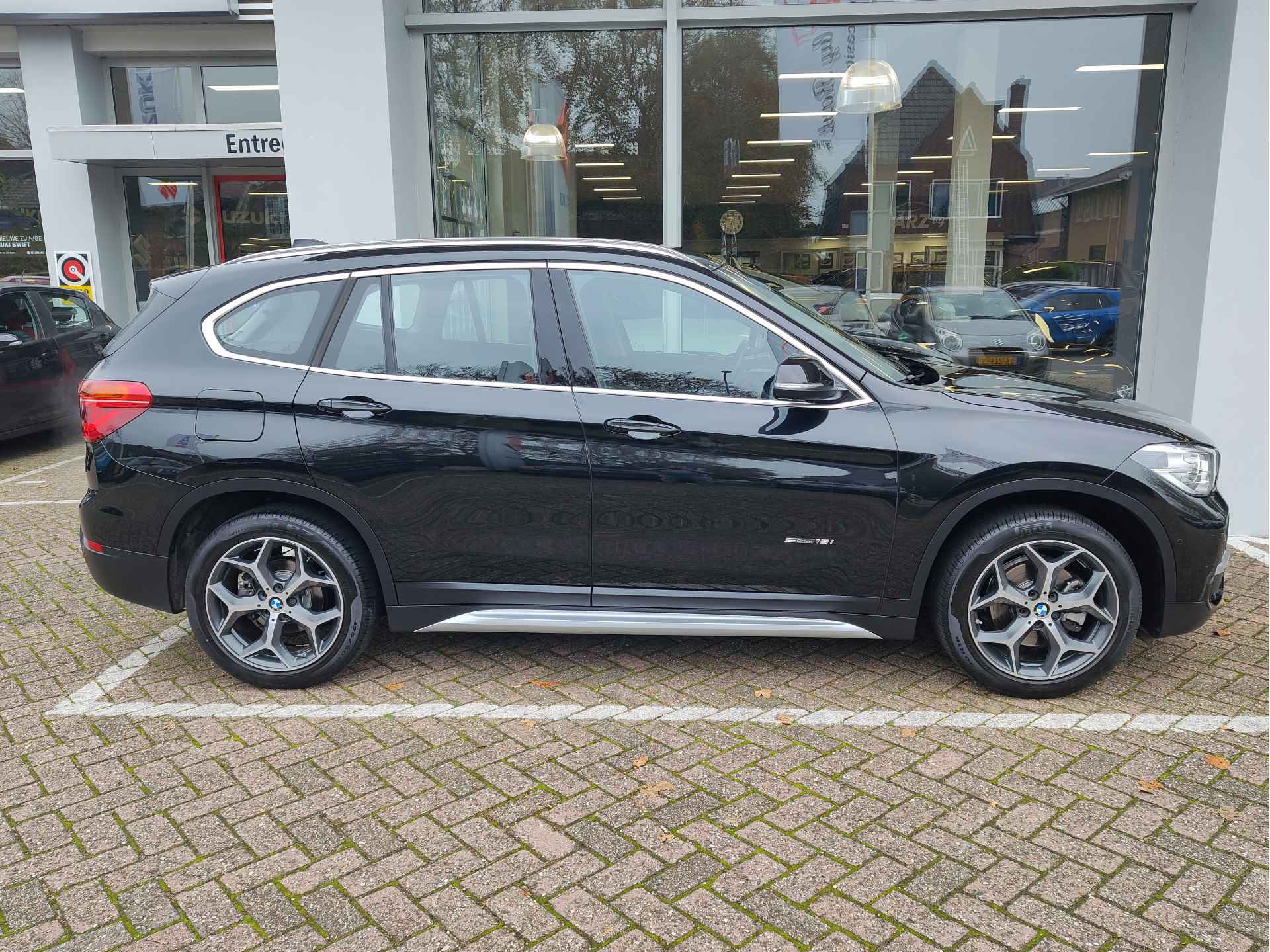 BMW X1 SDRIVE18i CENTENNIAL EXECUTIVE AUT. Leder | Navi | 18" Lichtmetalen velgen - 7/43