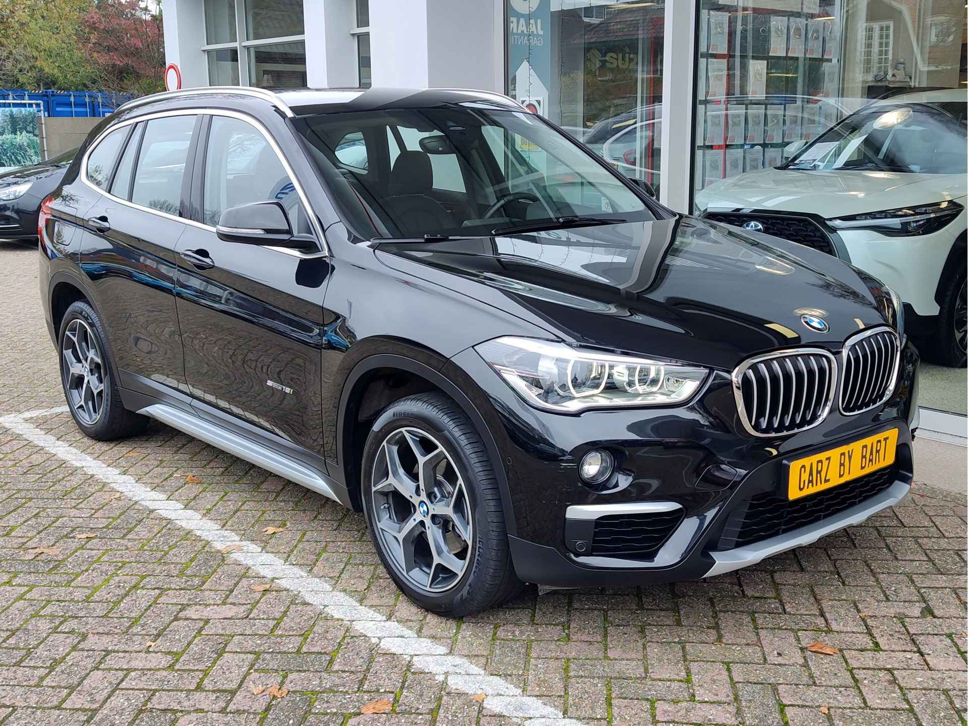 BMW X1 SDRIVE18i CENTENNIAL EXECUTIVE AUT. Leder | Navi | 18" Lichtmetalen velgen - 8/43