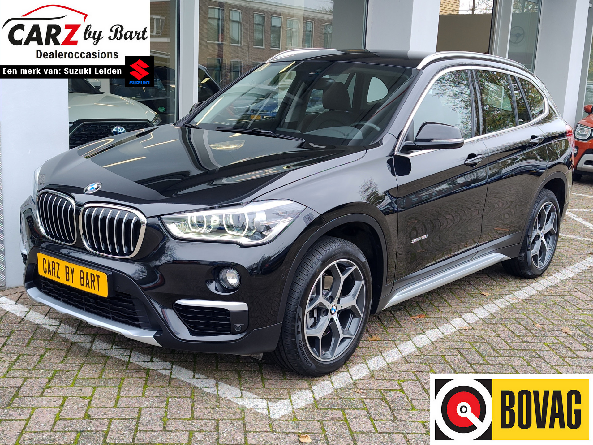 BMW X1 SDRIVE18i CENTENNIAL EXECUTIVE AUT. Leder | Navi | 18" Lichtmetalen velgen