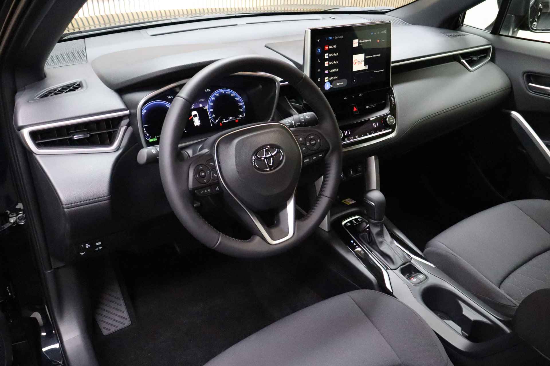 Toyota Corolla Cross 2.0 High Power Hybrid Style | Direct leverbaar | Dodehoekdetectie | Parkeersensoren | Elek. bedienbare achterklep - 12/29