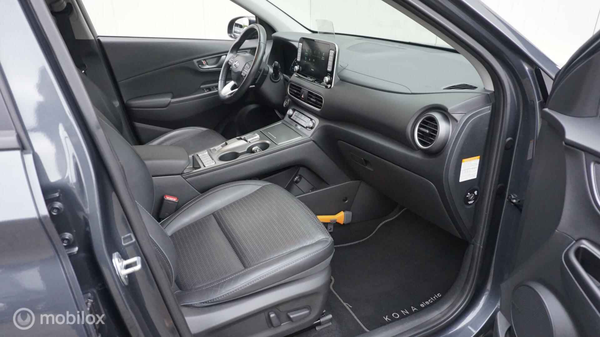 Hyundai Kona EV Premium 64 kWh Afn.Trekhaak | Leder | Elektr. Stoelverst. | Navi | Adapt. Cruise Control - 12/38