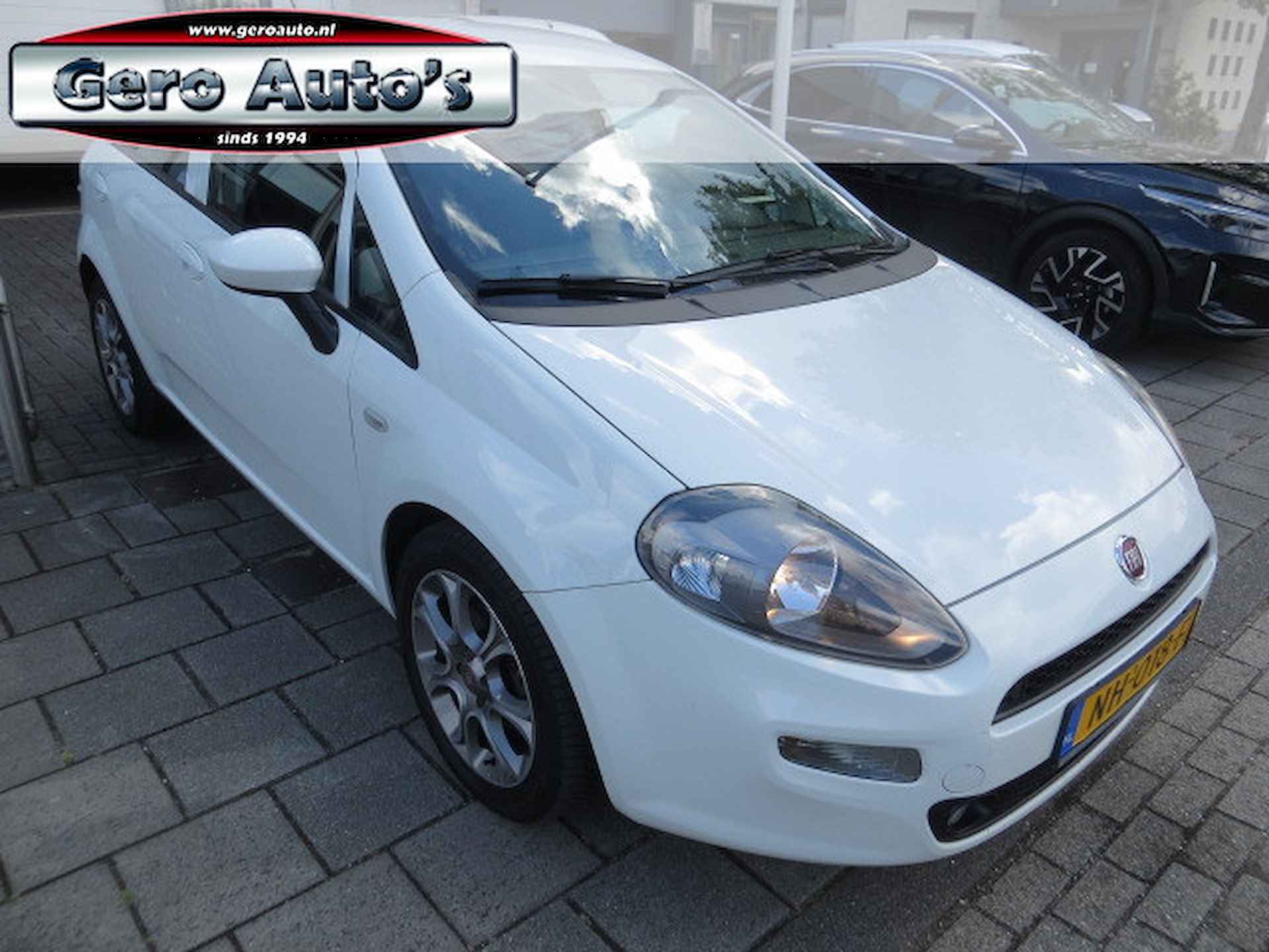 Fiat Punto Evo 0.9 TwinAir Lounge 5 deurs ,airco ecc,lmv,cruise control - 12/18