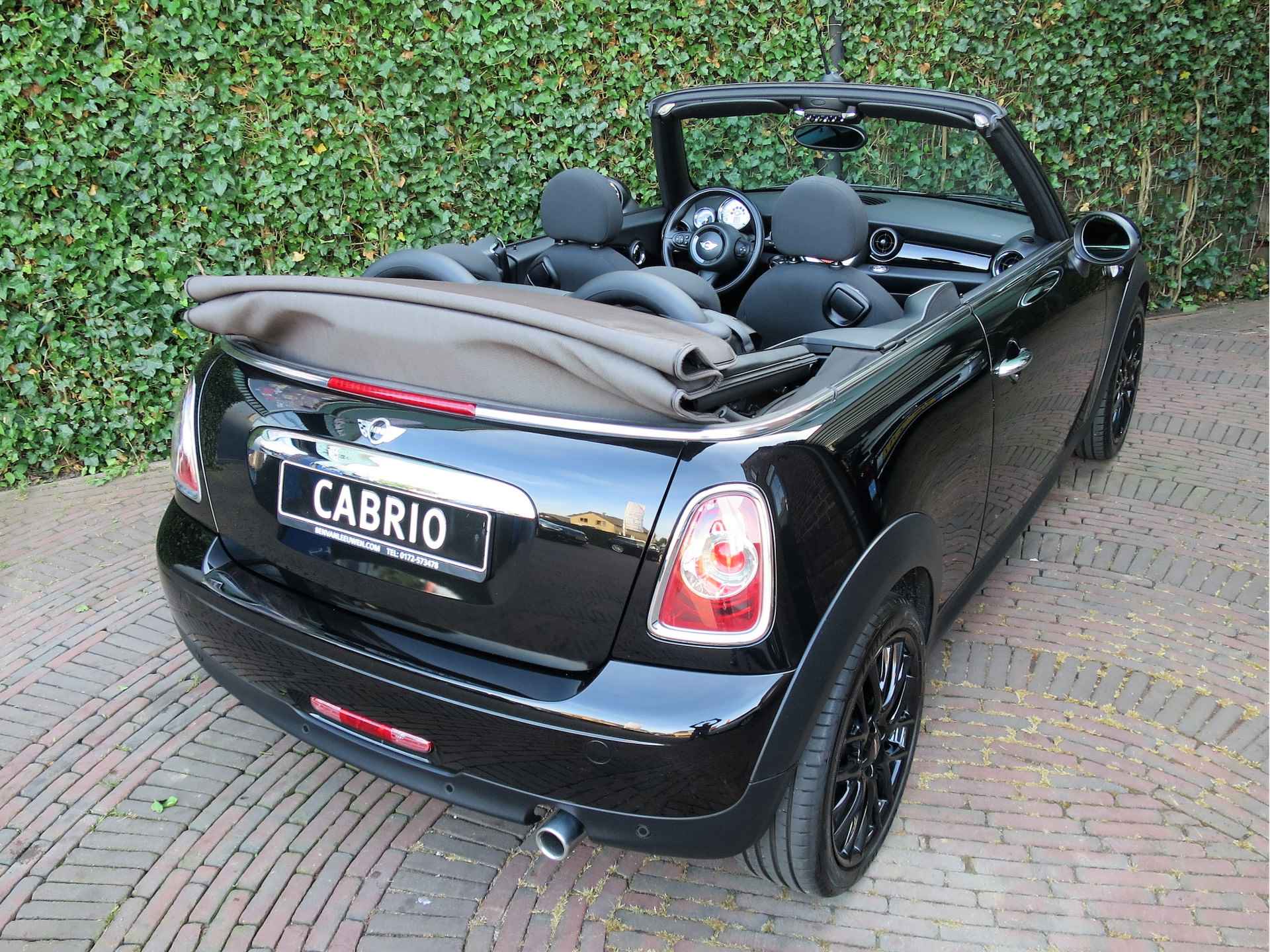 MINI Cabrio 1.6 Cooper Chili R57 LCI met Navi, Xenon, Keyless, leer/stof en 17" - 57/59