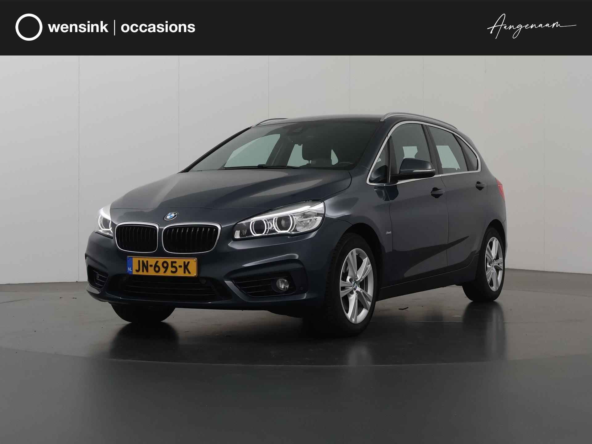 BMW 2-serie Active Tourer 218i Centennial Executive | Navigatie | Keyless Go | Climate control | Parkeersensoren | Trekhaak | HUD | Sportstoelen | - 1/38