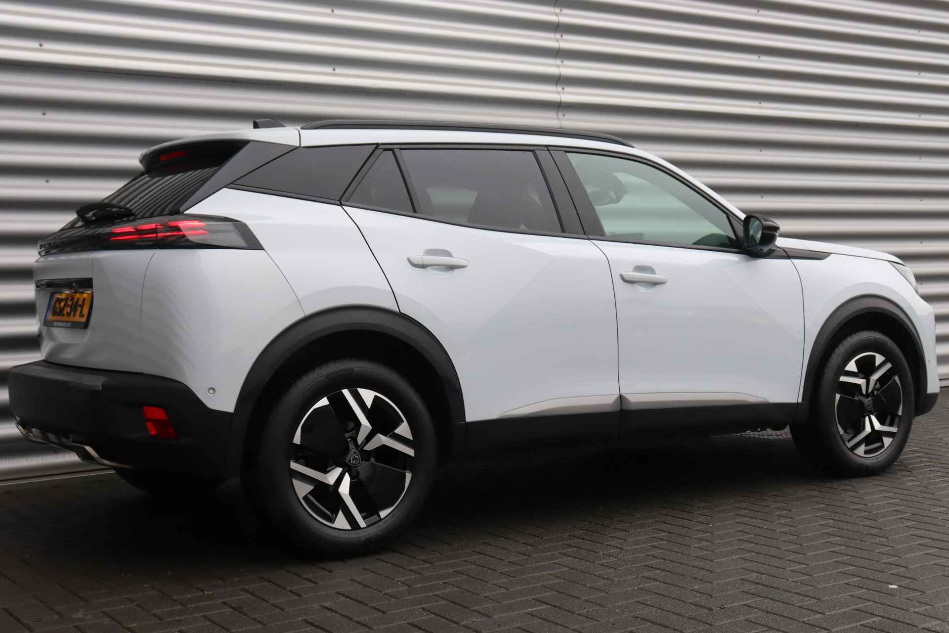 Peugeot 2008 1.2 PURETECH 130PK ALLURE AUTOMAAT / NAVI / LEDER / CLIMA / LED / PDC / 17" LMV / KEYLESS / CAMERA / ADAPT. CRUISECONTROL / 1E E - 7/40