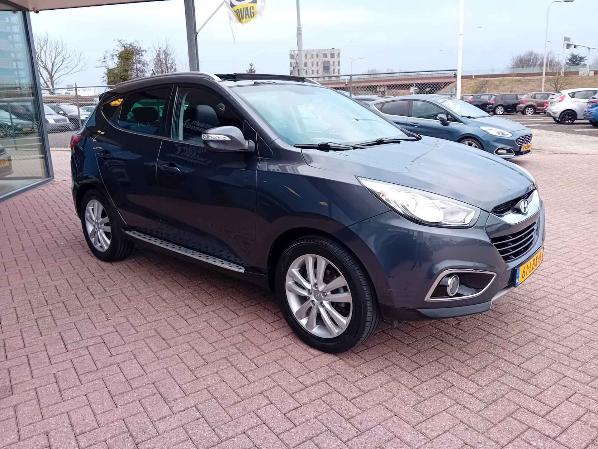 Hyundai ix35 2.0i i-Catcher Automaat, Airco(automatisch), Multimediasysteem, Bluetooth, Navigatie, Camera, Cruise control, Panorama schuif ka Lichtmetalen velgen, BOVAG - 4/30