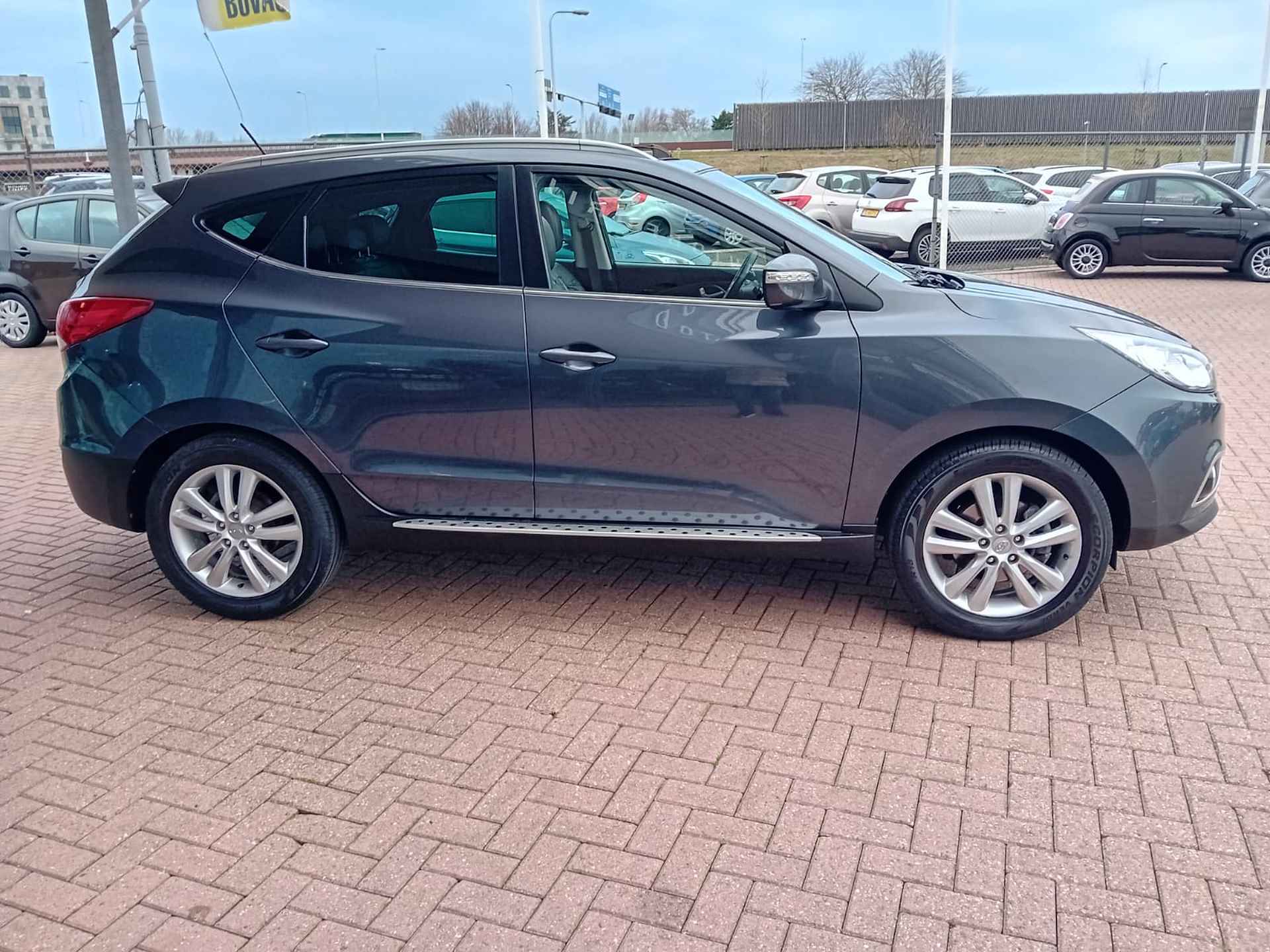 Hyundai ix35 2.0i i-Catcher Automaat, Airco(automatisch), Multimediasysteem, Bluetooth, Navigatie, Camera, Cruise control, Panorama schuif ka Lichtmetalen velgen, BOVAG - 5/30