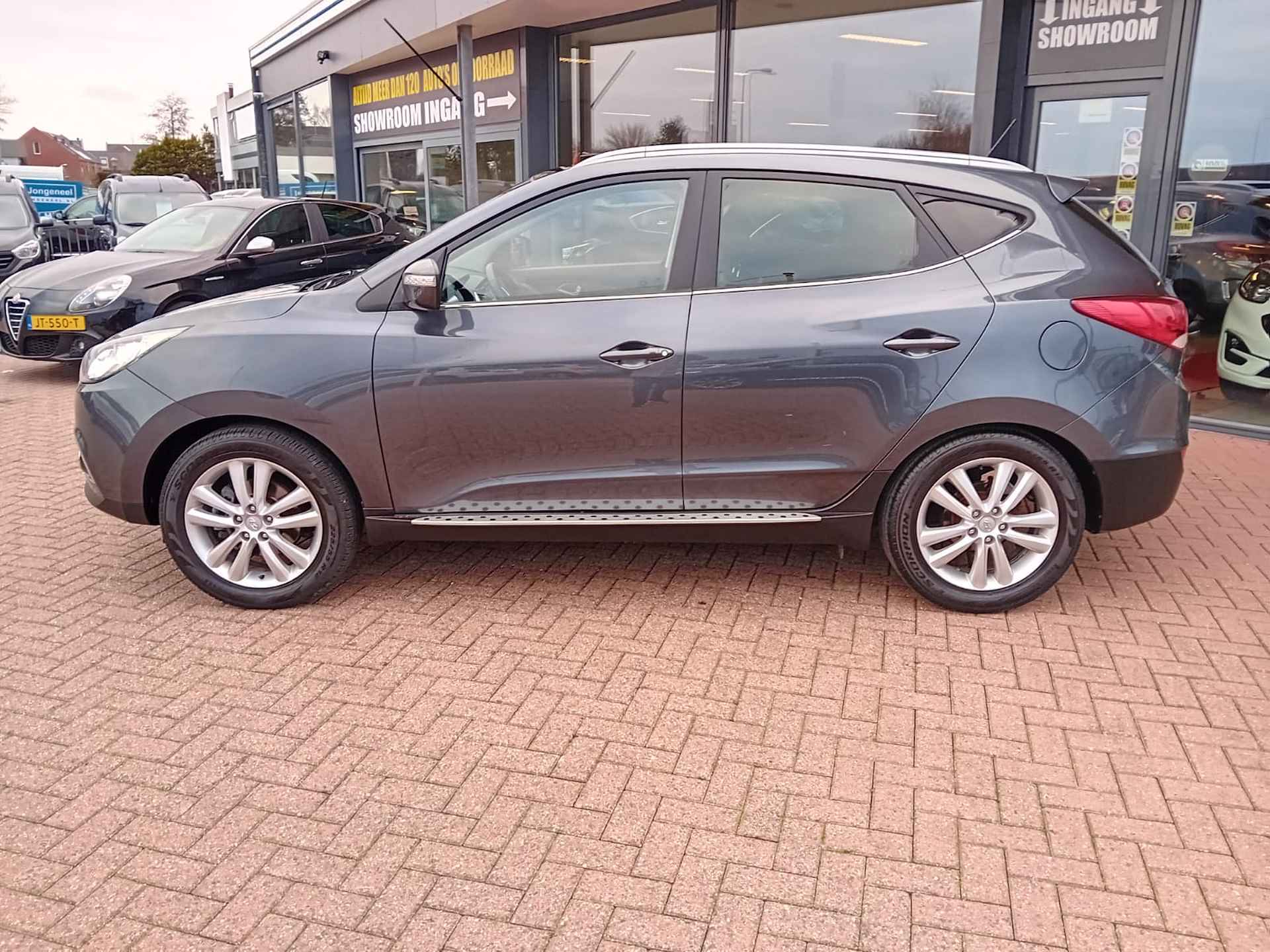 Hyundai ix35 2.0i i-Catcher Automaat, Airco(automatisch), Multimediasysteem, Bluetooth, Navigatie, Camera, Cruise control, Panorama schuif ka Lichtmetalen velgen, BOVAG - 9/30