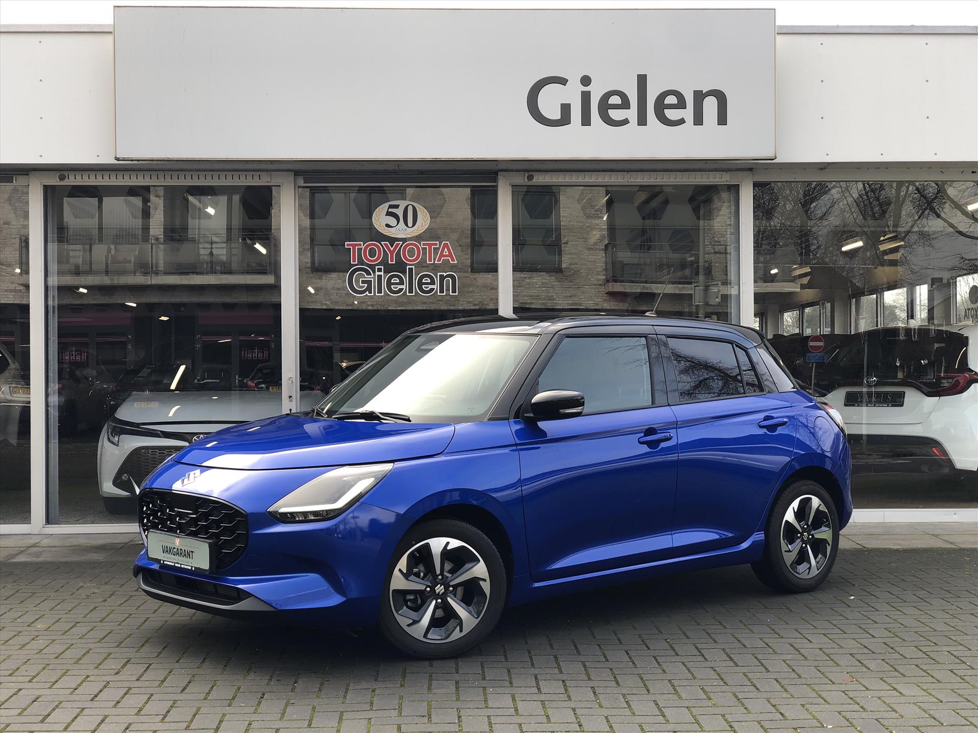 Suzuki Swift 1.2 DualJet Hybrid Style | Dodehoekherkenning, Parkeersensoren, Stoelverwarming, Apple CarPlay/Android Auto, Nieuw model!