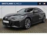 BMW i4 M50 High Executive 84 kWh / BMW M 50 Jahre uitvoering / Schuif-kanteldak / Laserlight / M Sportstoelen / Parking Assistant Plus / Driving Assistant Professional