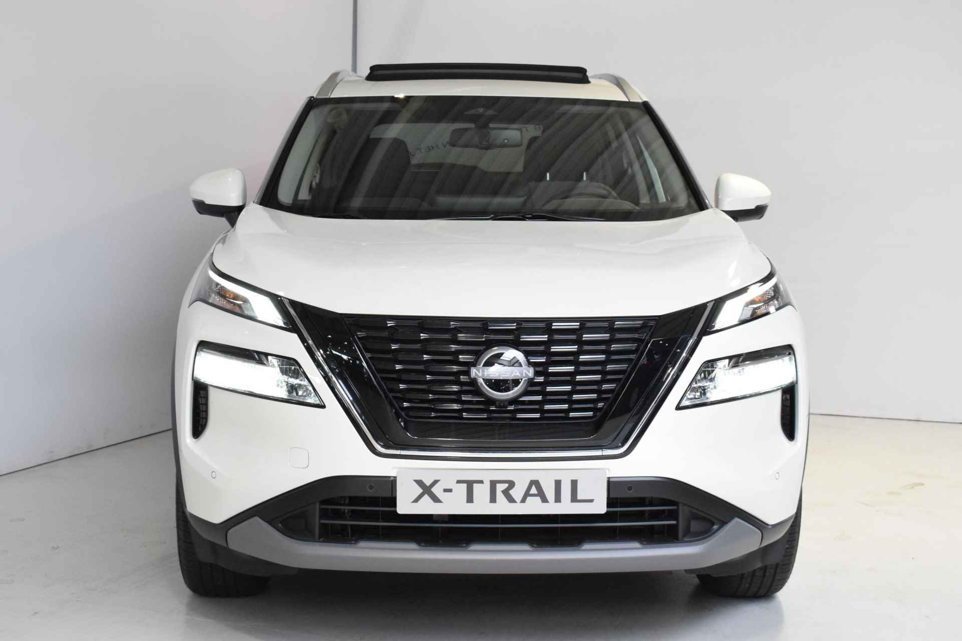 Nissan X-Trail 1.5 e-4orce N-Connecta 4WD 7p. UIT VOORRAAD LEVERBAAR| €10.000,- KORTING OP=OP| Schuif/Kantel dak | 360-Camera | Parkeersensoren | Dodehoek detectie | Adaptive cruise control | Navigatie | Apple Carplay/Android auto | Automatische regen/lichtsensor | - 2/63