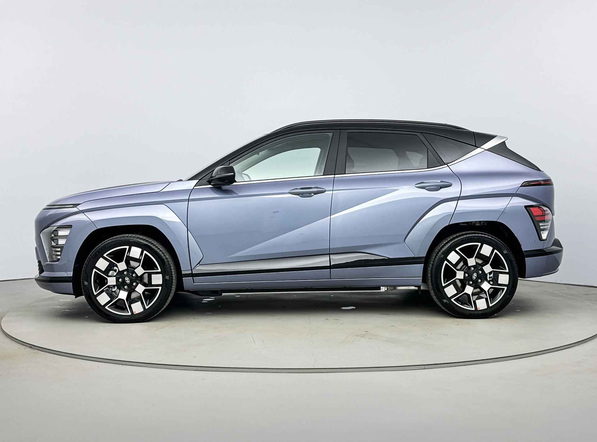 Hyundai Kona Electric Premium 65.4 kWh | Leer | Memory | Stoelventilatie | Warmtepomp | V2L | Adaptive cruise | Navigatie | - 4/31
