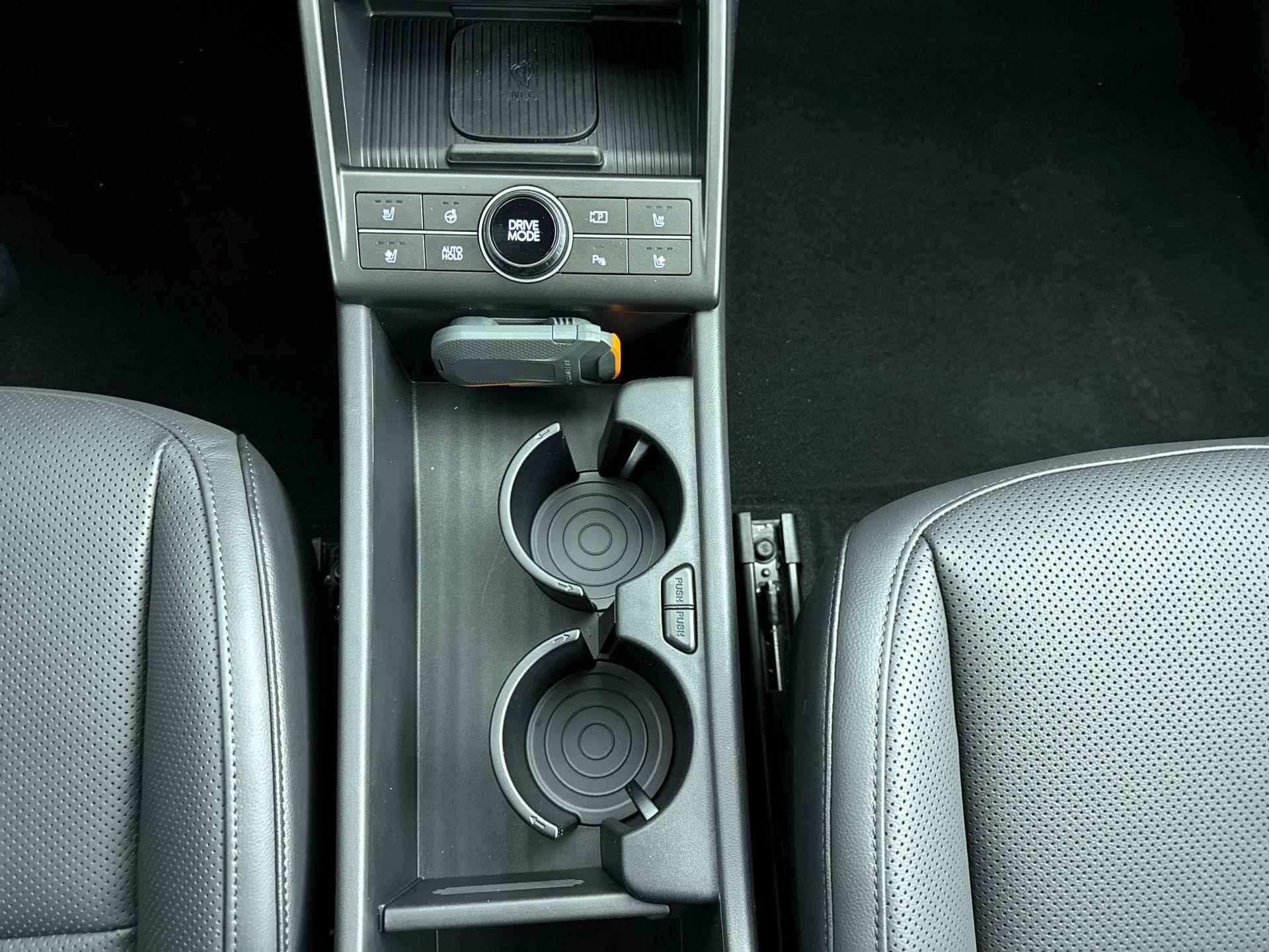 Hyundai Kona Electric Premium 65.4 kWh | Leer | Memory | Stoelventilatie | Warmtepomp | V2L | Adaptive cruise | Navigatie | - 12/31