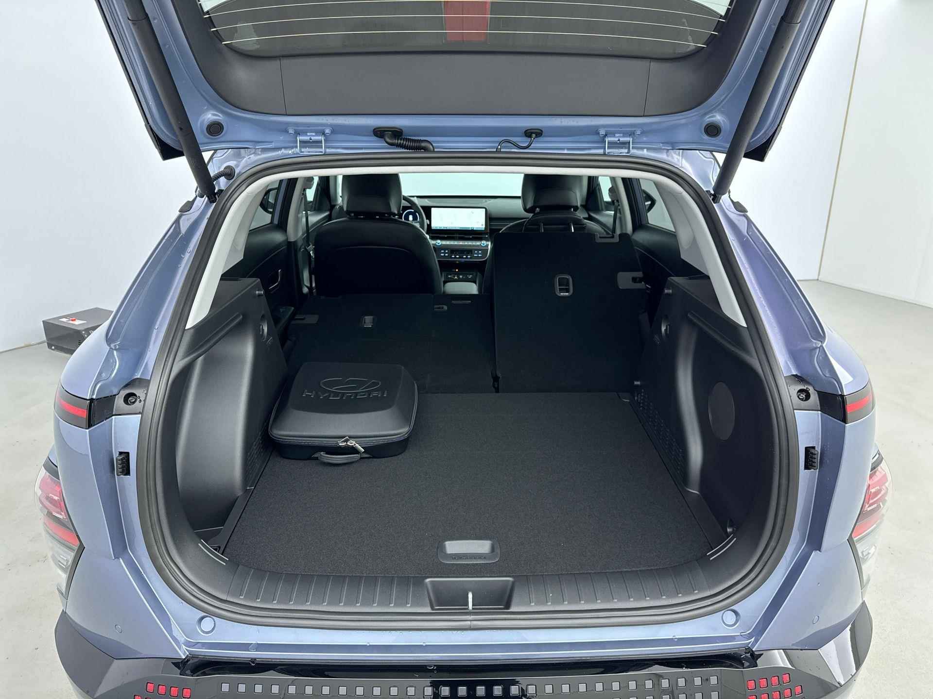 Hyundai Kona Electric Premium 65.4 kWh | Leer | Memory | Stoelventilatie | Warmtepomp | V2L | Adaptive cruise | Navigatie | - 28/31