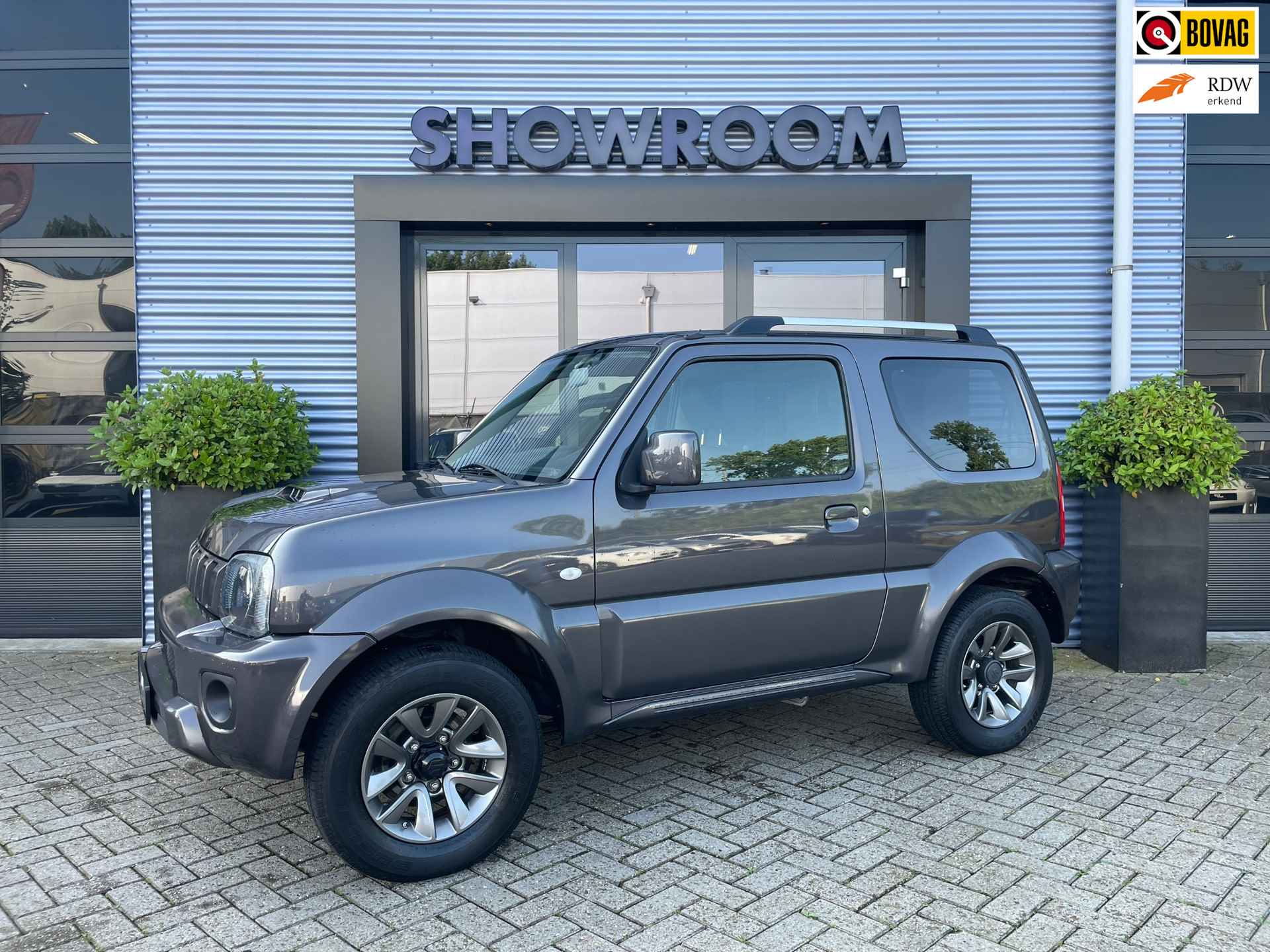 Suzuki JIMNY 1.3 Exclusive Leer|Afneembare trekhaak|Airco|Carbox met scheidingsrek - 1/26