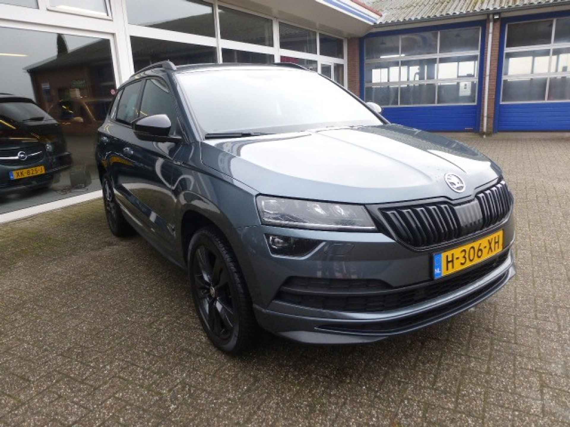 SKODA Karoq 1.5 TSI ACT Sportline Business, Automaat, Wegdraaibare trekh. - 6/45