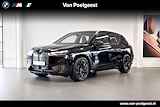 BMW iX xDrive40 Business Edition Plus 77 kWh | Driving Assistant Pro | Harman Kardon | Glazen Panoramadak | Trekhaak |