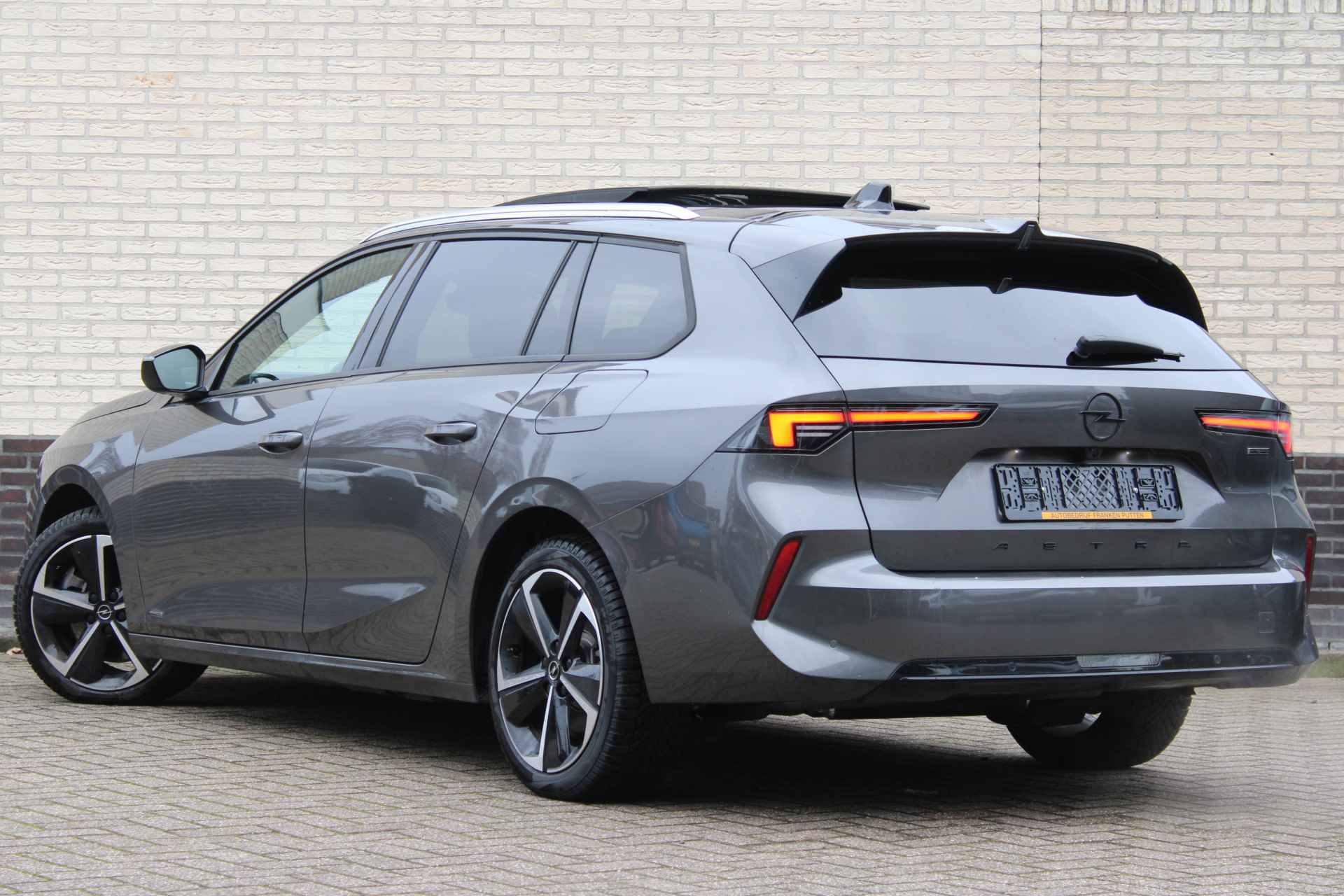 Opel Astra Sports Tourer 1.6 Turbo Plug In Hybrid Ultimate | Panoramadak | AGR | Navigatie | Luxe - 3/43