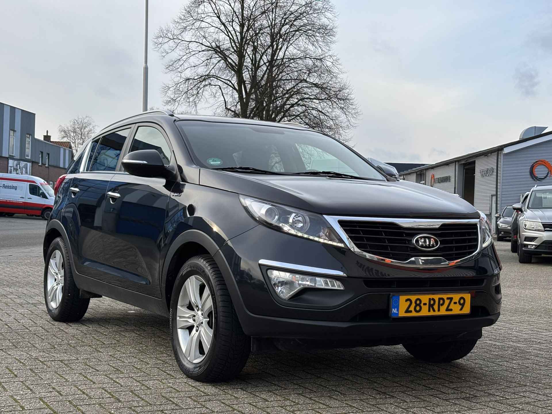 Kia Sportage 2.0 X-ecutive 4wd Plus Pack / Achterruitrijcamera / Cruise Control / Afneembare Trekhaak / - 17/33