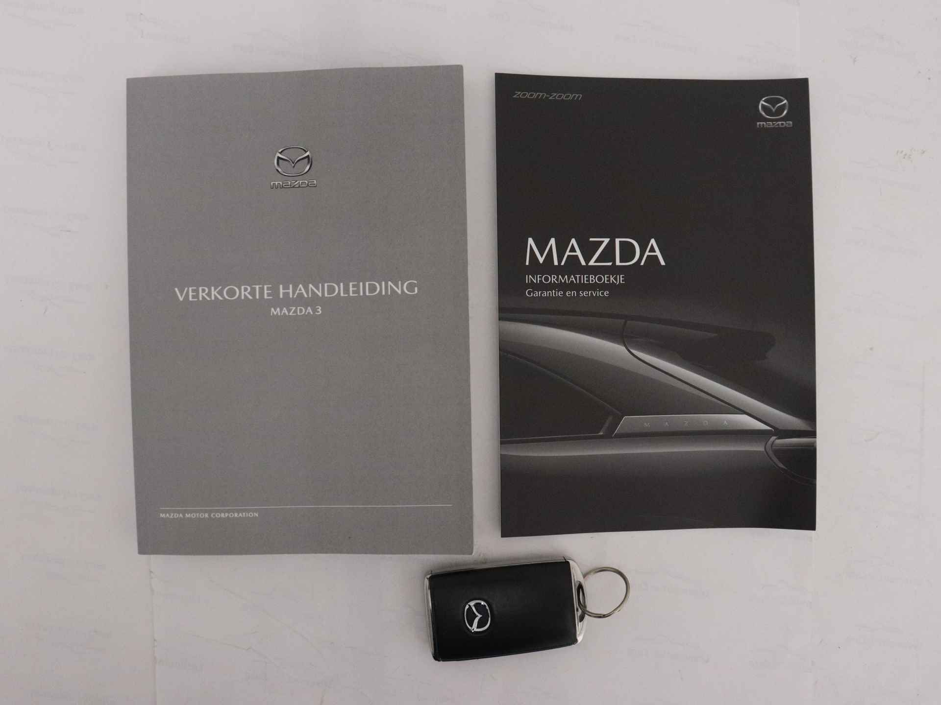 Mazda 3 2.0 e-SkyActiv-G M Hybrid 150 Exclusive-line Automaat | Camera | Climate Control - 14/45