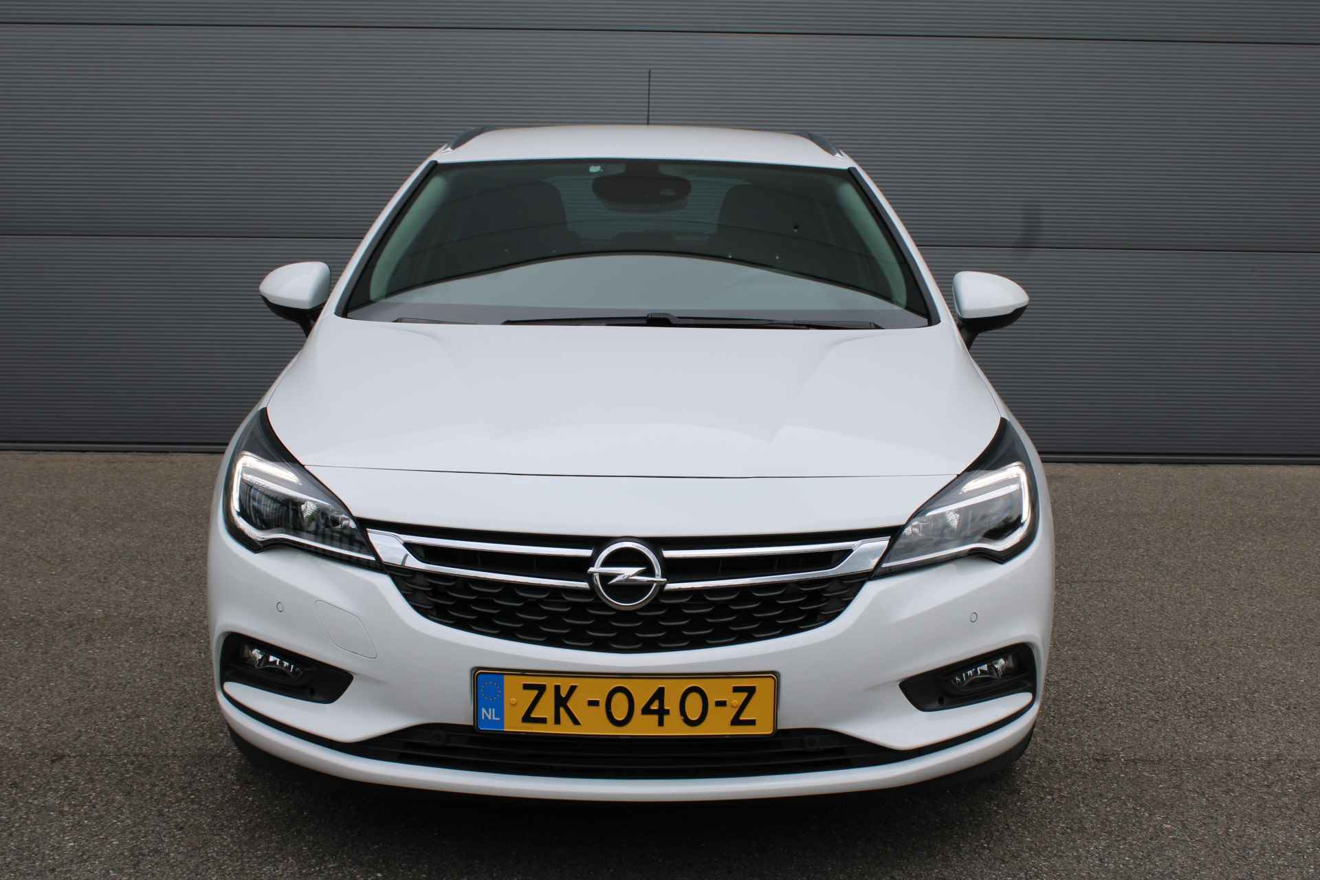 Opel Astra Sports Tourer 1.4 Turbo 120 Jaar Edition | AUTOMAAT | AIRCO | NAVI | PDC V+A | - 2/25