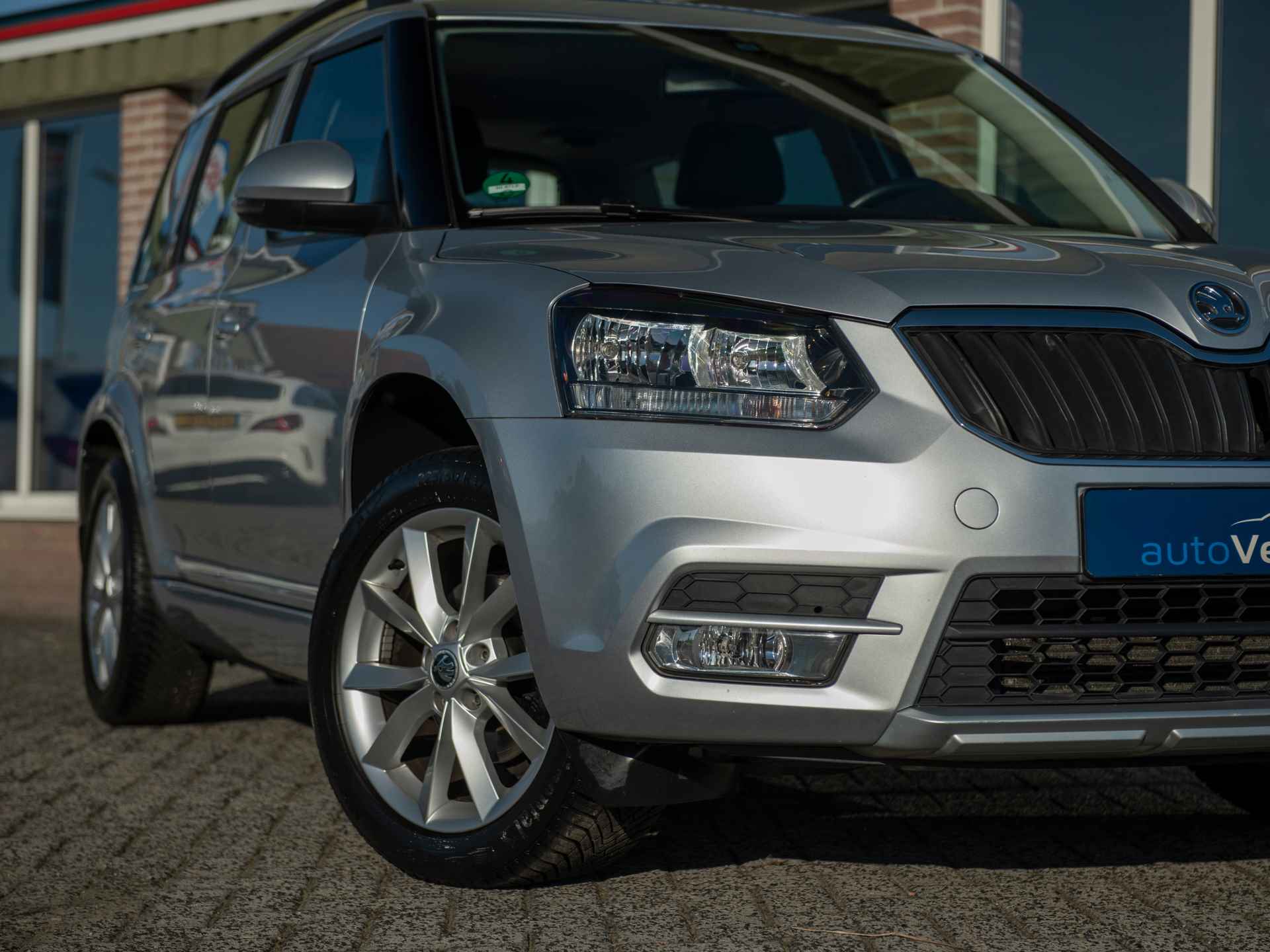 Škoda Yeti Outdoor 1.2 TSI Ambition Aut. | Facelift model | Trekhaak | 17" Lichtmetalen velgen - 28/43