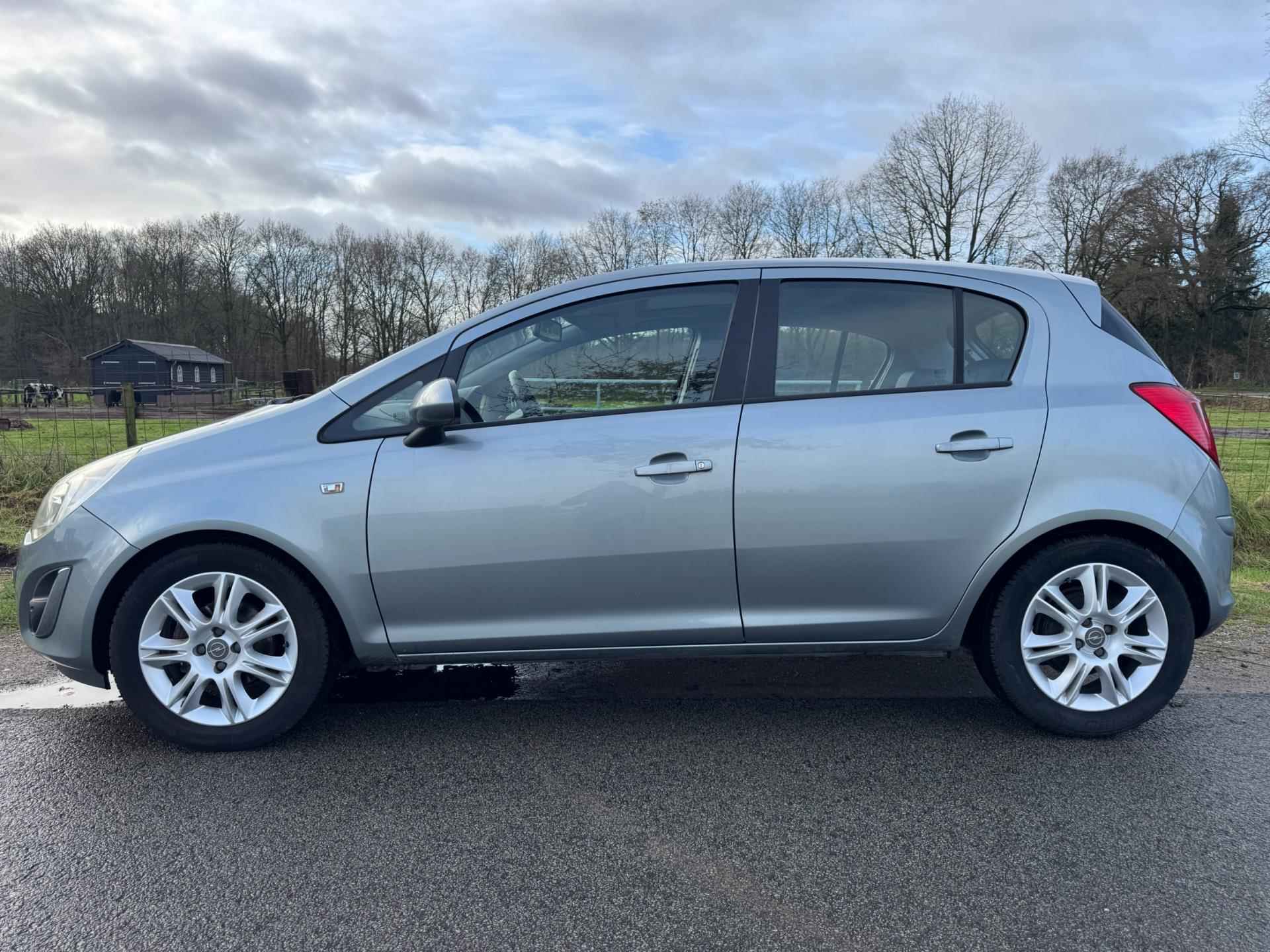 Opel Corsa 1.4-16V Cosmo 101PK met open dakje en stoelverwarming - 3/29