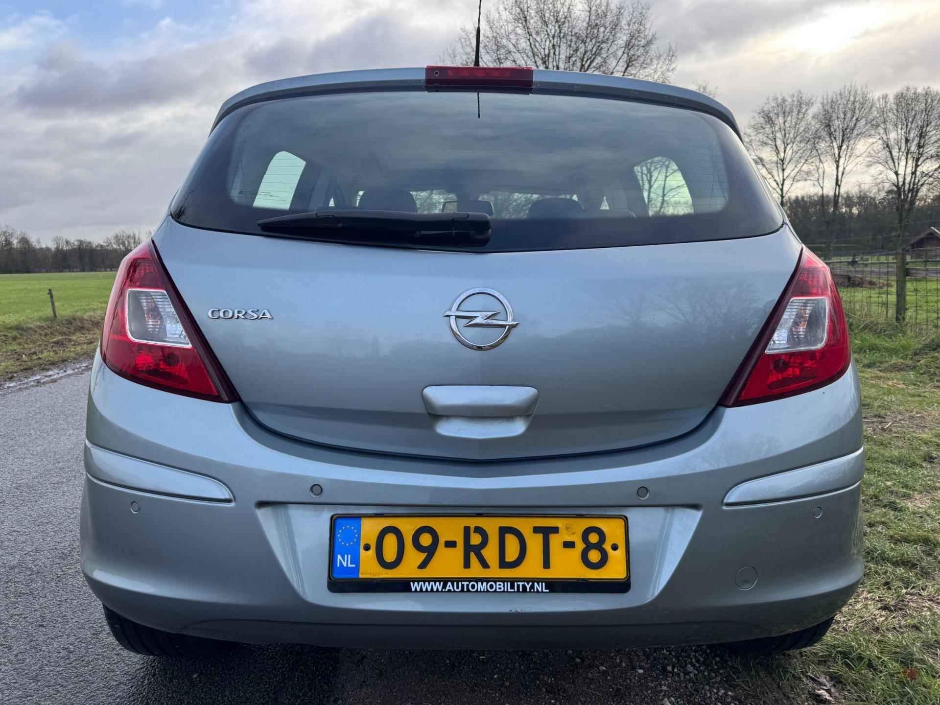 Opel Corsa 1.4-16V Cosmo 101PK met open dakje en stoelverwarming - 6/29