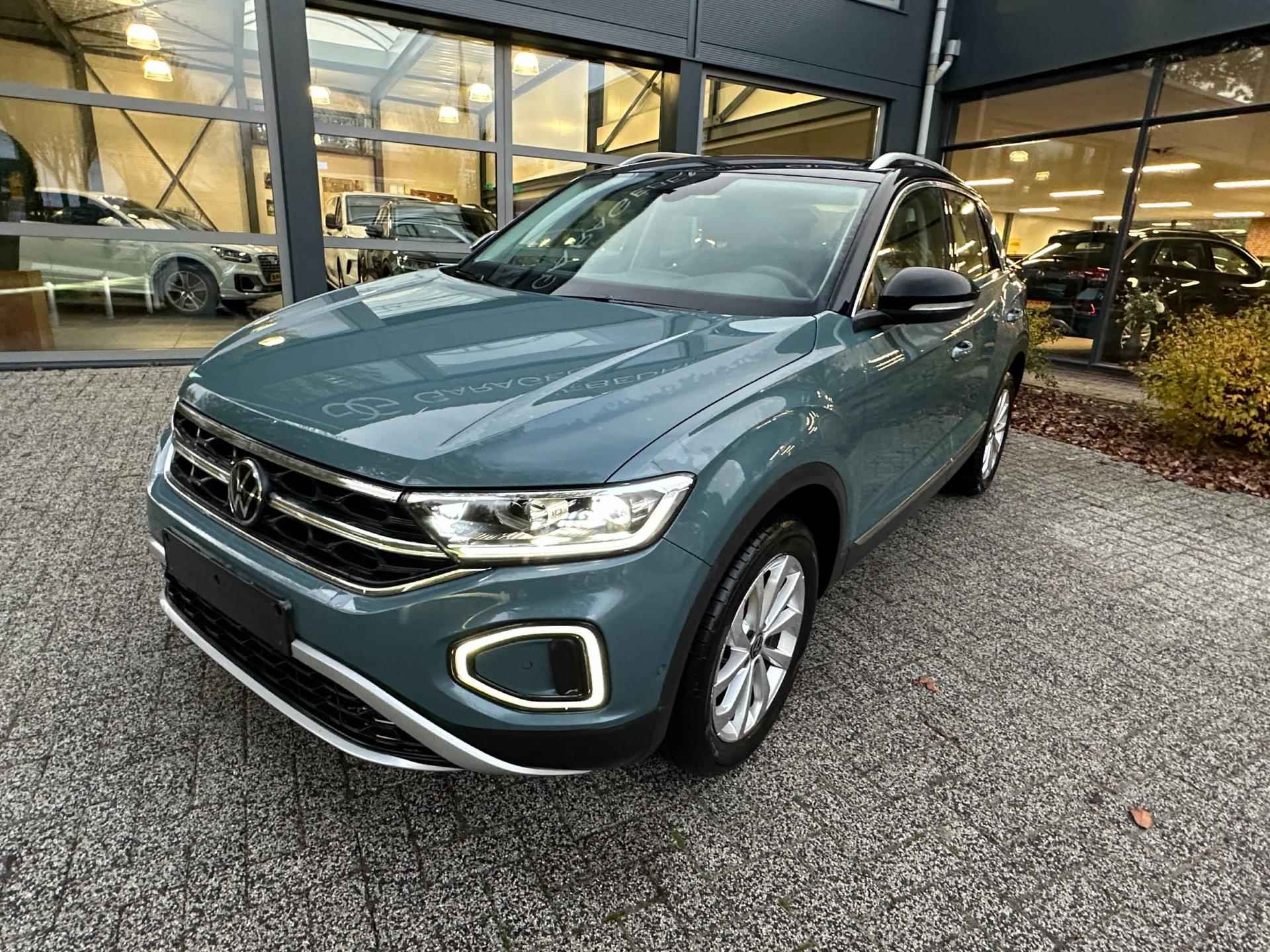 Volkswagen T-Roc 1.5 TSI style 150pk -stoel-stuurverw. carplay - trekhaak - 12/34