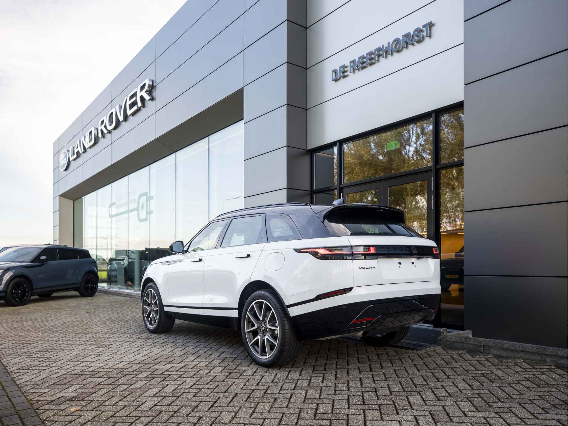 Land Rover Range Rover Velar P400e 404pk AWD Dynamic HSE PHEV | Ostuni White | Head-up Display | Black Pack | Ambiance Verlichting | Stoelventilatie - 11/55