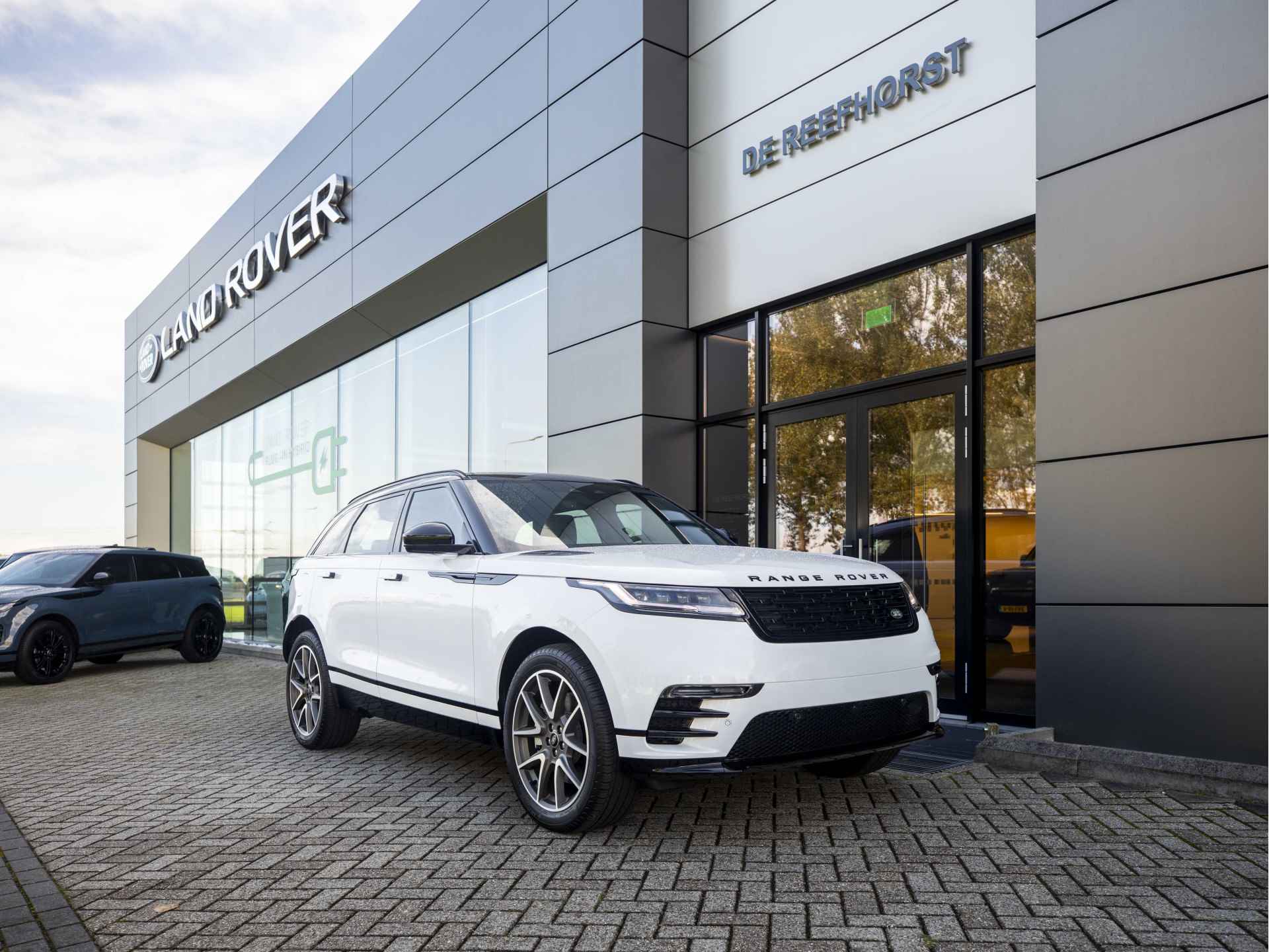 Land Rover Range Rover Velar P400e 404pk AWD Dynamic HSE PHEV | Ostuni White | Head-up Display | Black Pack | Ambiance Verlichting | Stoelventilatie - 13/55