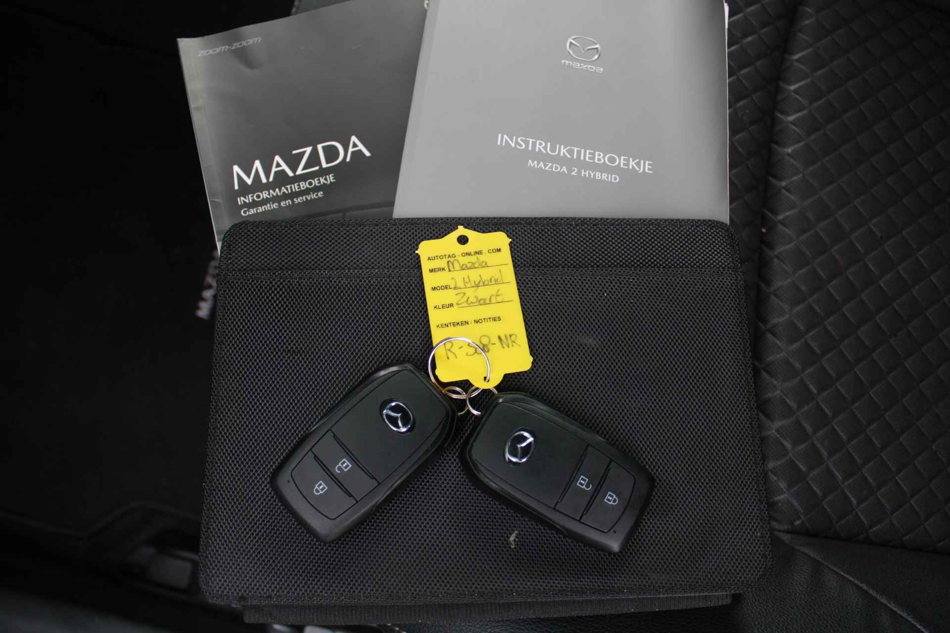 Mazda 2 Hybrid 1.5 Select | Airco | Navi | Cruise | PDC | Head-up display | Keyless | Camera | - 37/37