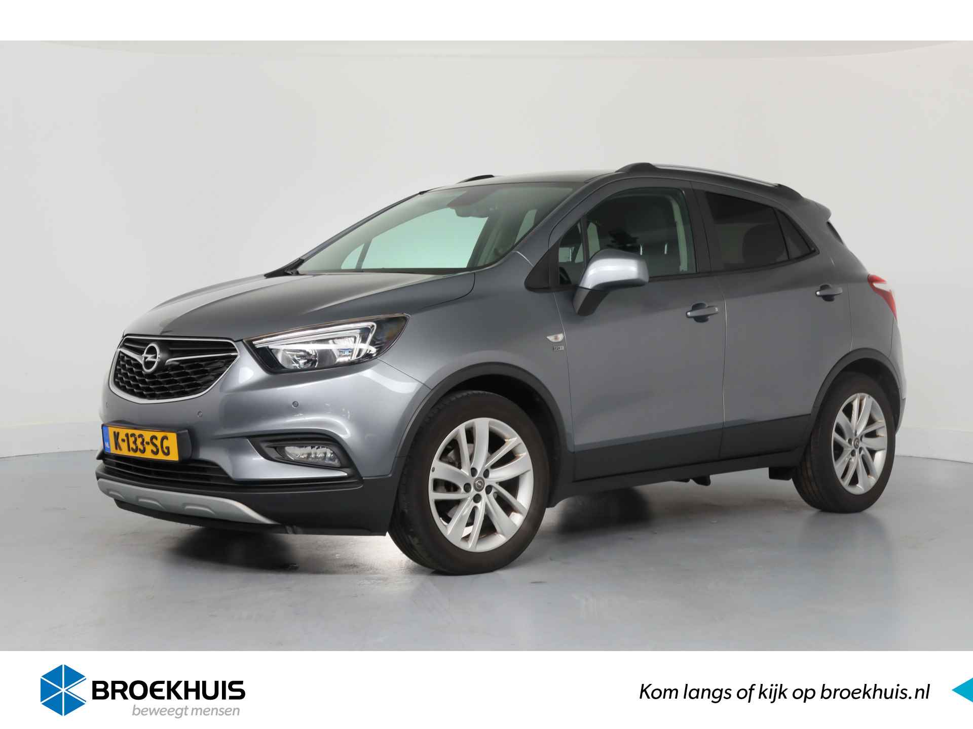 Opel Mokka X 1.4 Turbo 120 Jaar Edition | Trekhaak | Navigatie | Climate Control | Camera | Winterpakket | Cruise | Parkeersensoren V+A | Lic - 1/2