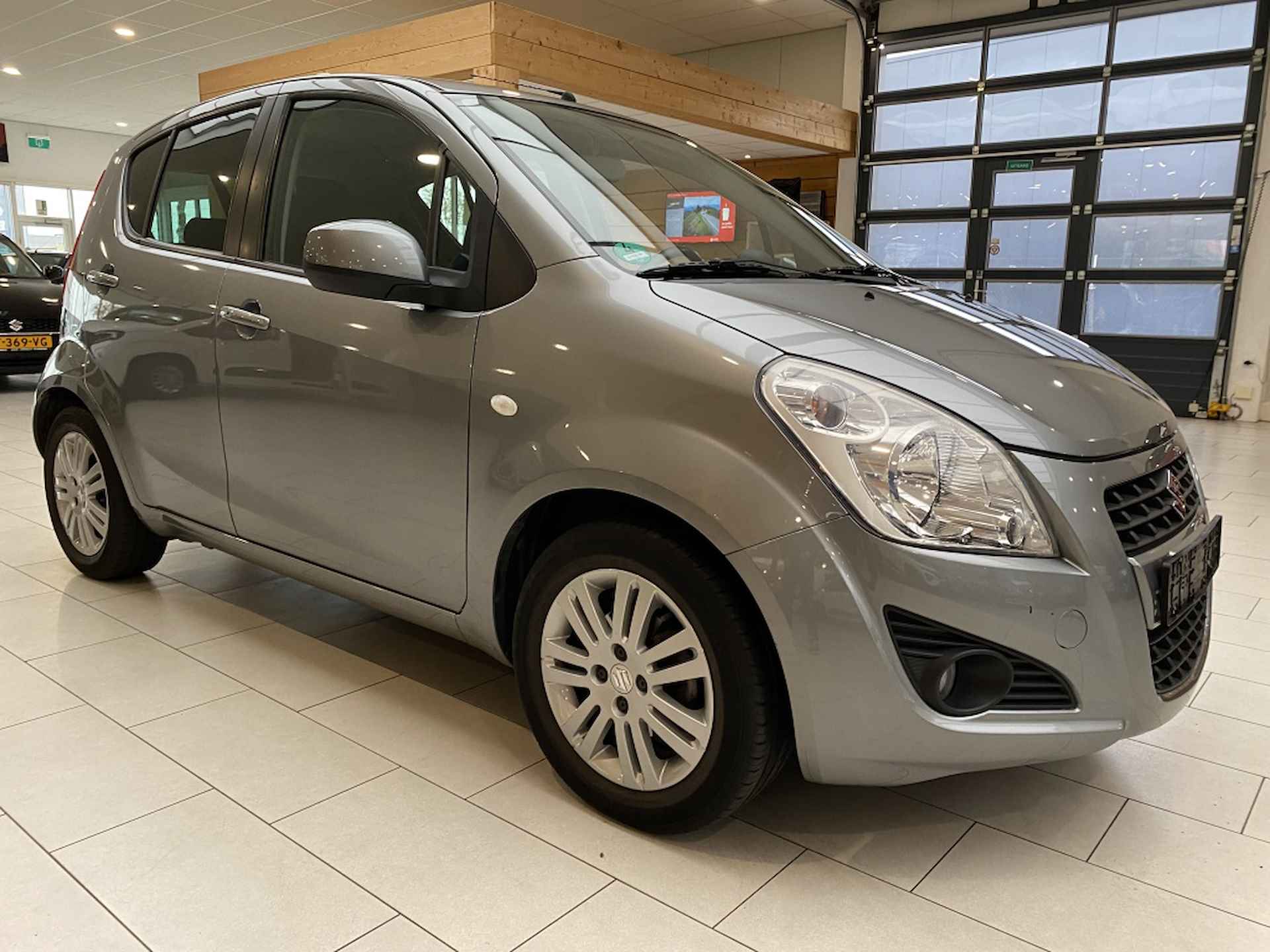 Suzuki Splash 1.2 Exclusive [ Airco | Lichtmetaal | Stoelverwarming ] - 10/26