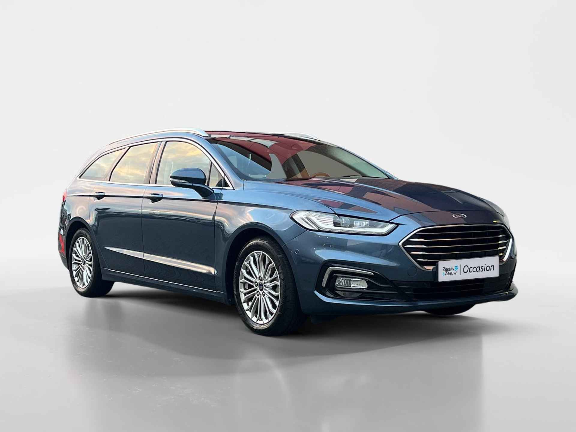 Ford Mondeo Wagon 2.0 IVCT HEV Titanium |Navigatie| Dode hoek detectie| Applecarplay |Elektrische achterklep| - 4/38