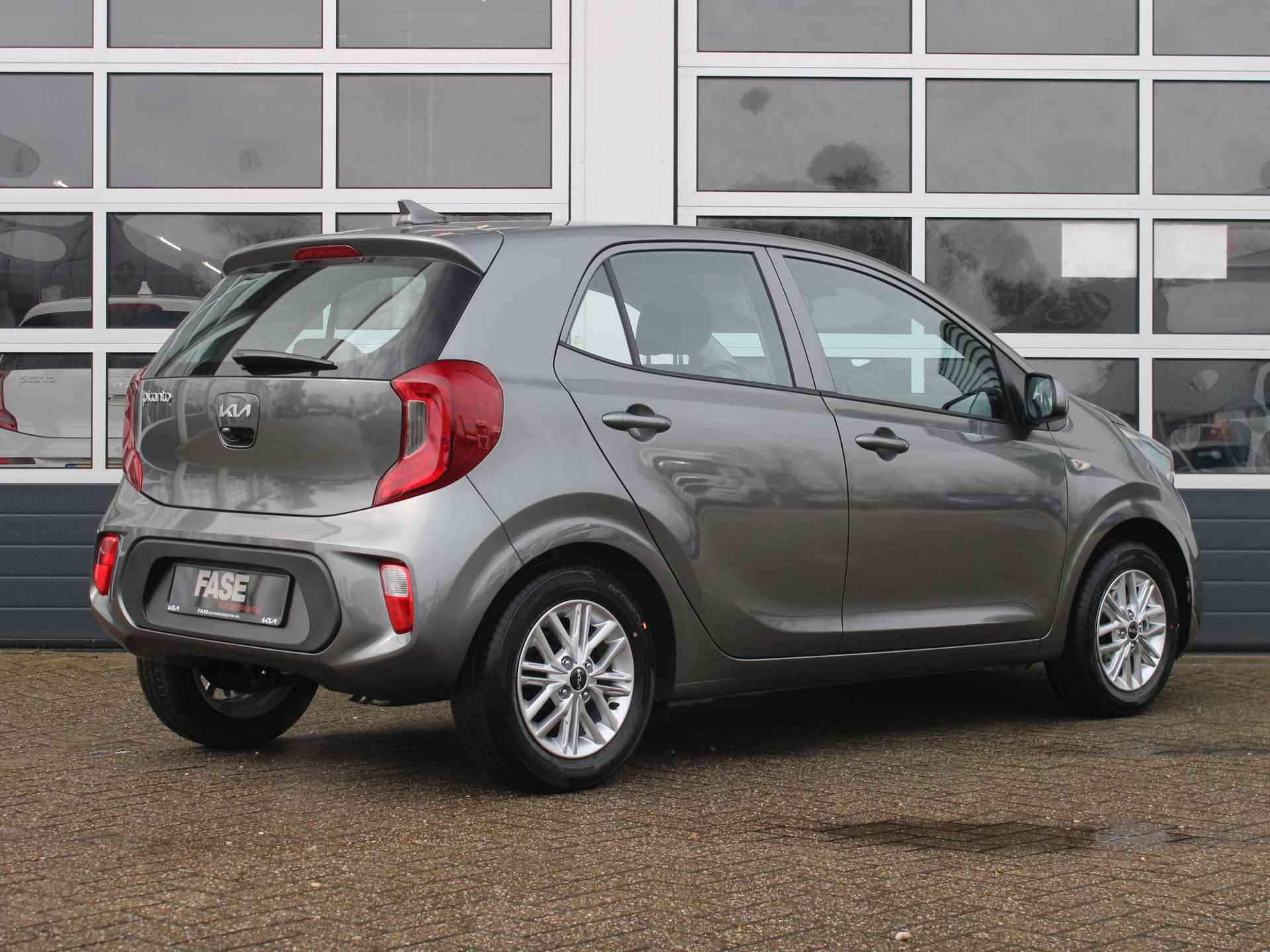 Kia Picanto 1.0 DPi DynamicLine | Voorraad | Airco | Cruise | Camera | Apple Carplay | 14" - 2/29