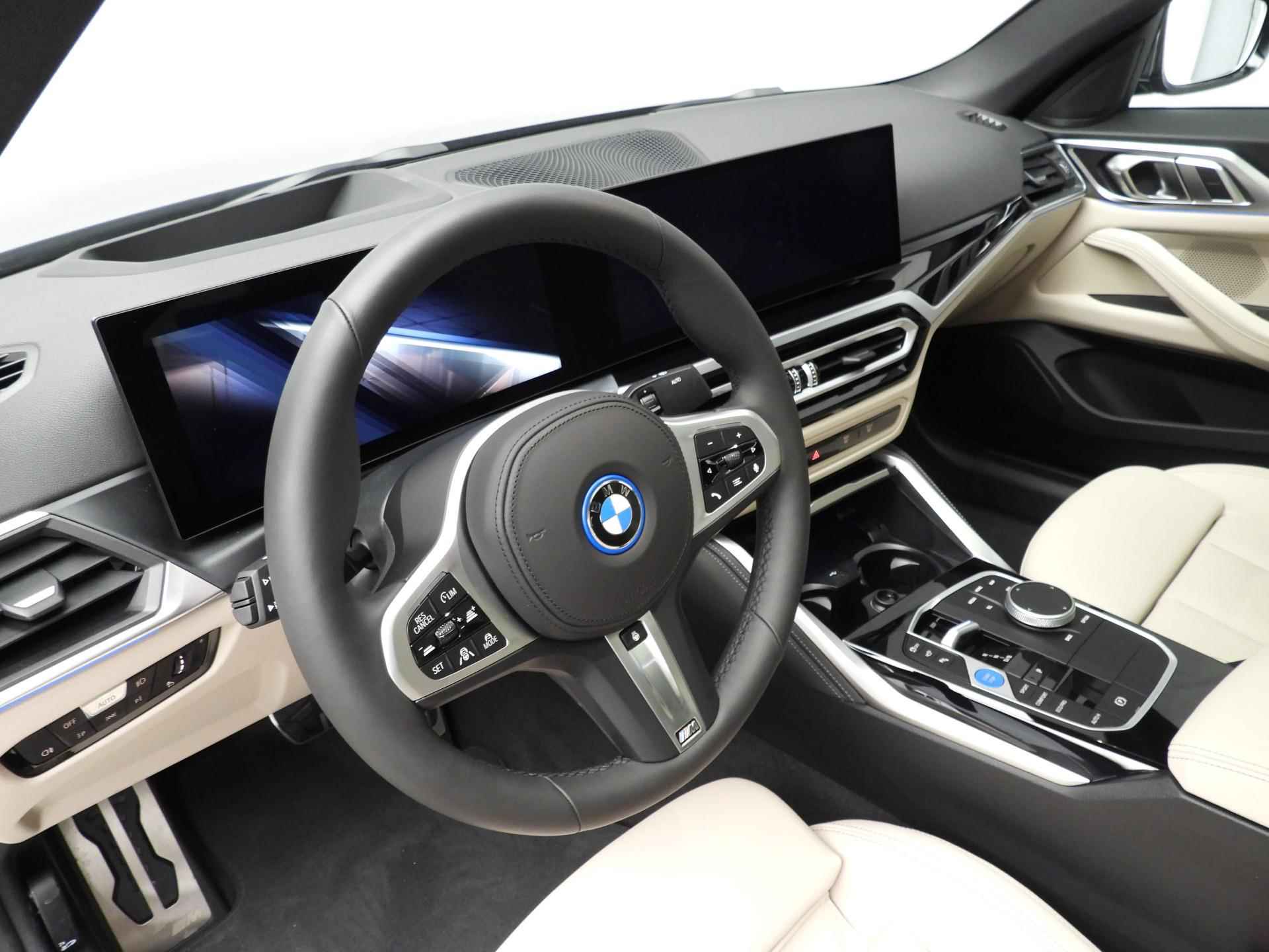 BMW i4 Gran Gran Coupé eDrive40 | M-Sportpakket | LED | Leder | Navigatie | Trekhaak | Schuifdak | Keyles go | Sportstoelen | DAB | Hifi speakers | Alu 19 inch - 7/46