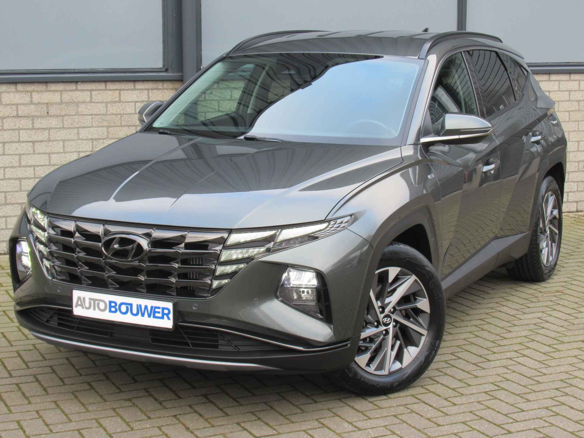 Hyundai Tucson 1.6 T-GDI MHEV Comfort Smart 2e eigen | dealer onderh | navi | camera | cruise - 4/26