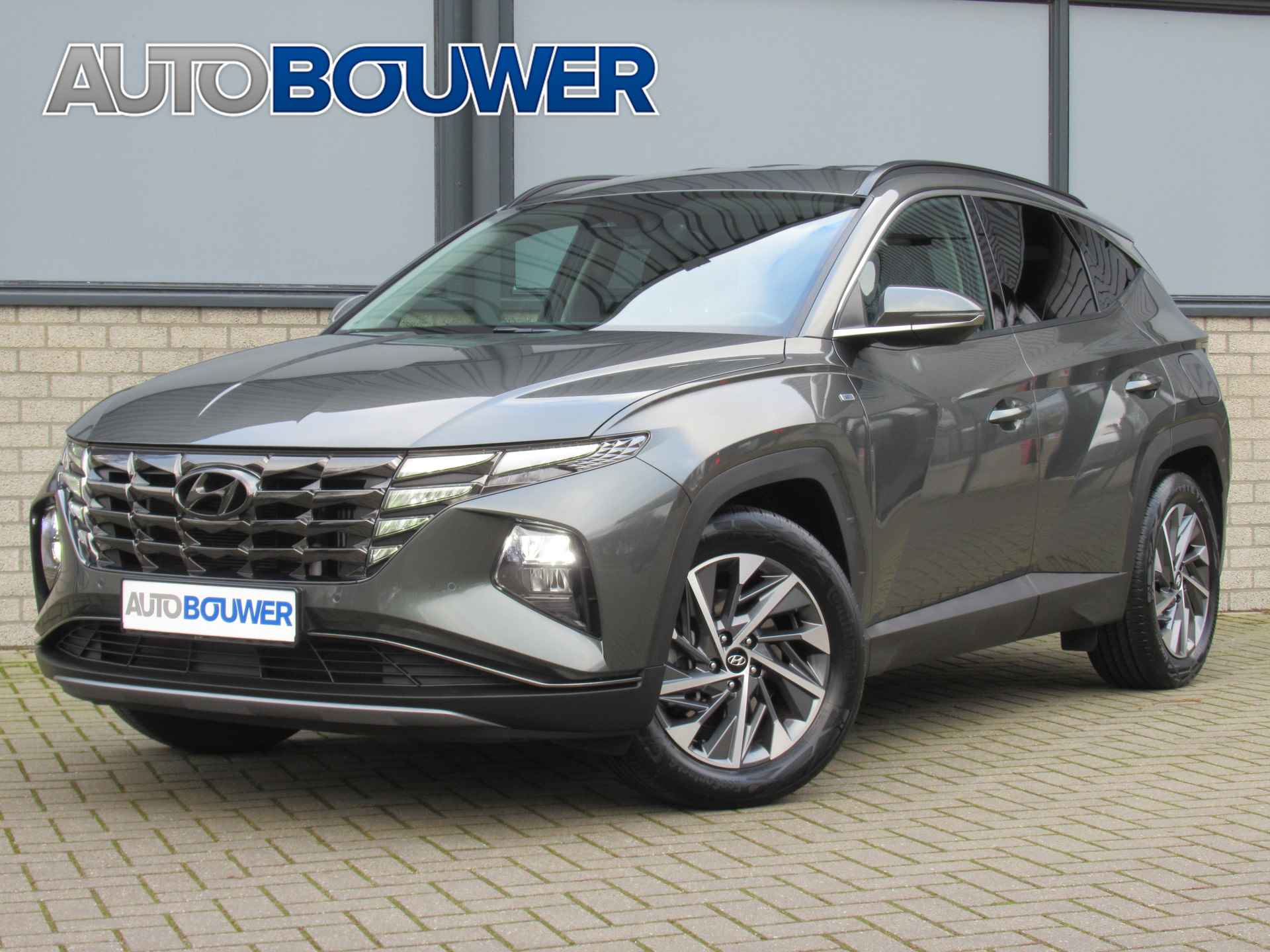 Hyundai Tucson 1.6 T-GDI MHEV Comfort Smart 2e eigen | dealer onderh | navi | camera | cruise - 1/26