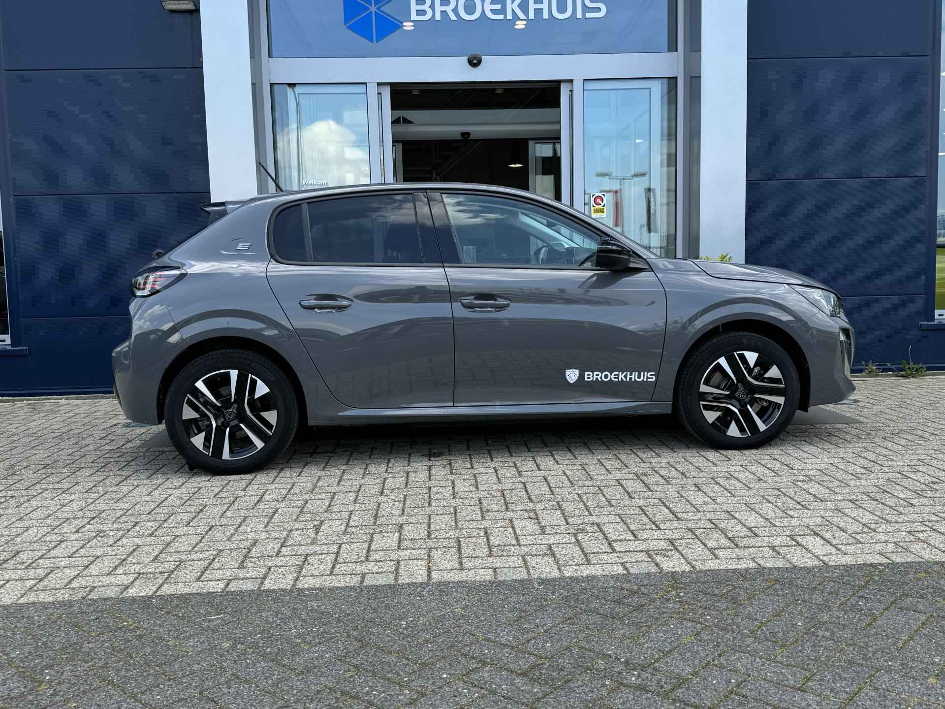 Peugeot e-208 Style 50 kWh | Warmtepomp | Parkeersensoren V/A | Stoelverwarming | Keyless | Navigatie - 11/39